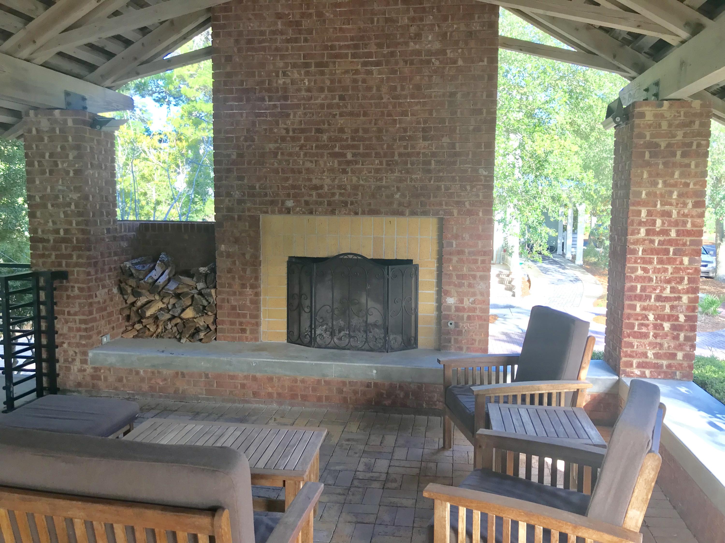 Lot 45 Pontchartrain Santa Rosa Beach Santa Rosa Beach, FL 32459 - Photo 12 of 21 a living room with furniture and a fireplace