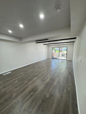 a view of a big house with a big yard