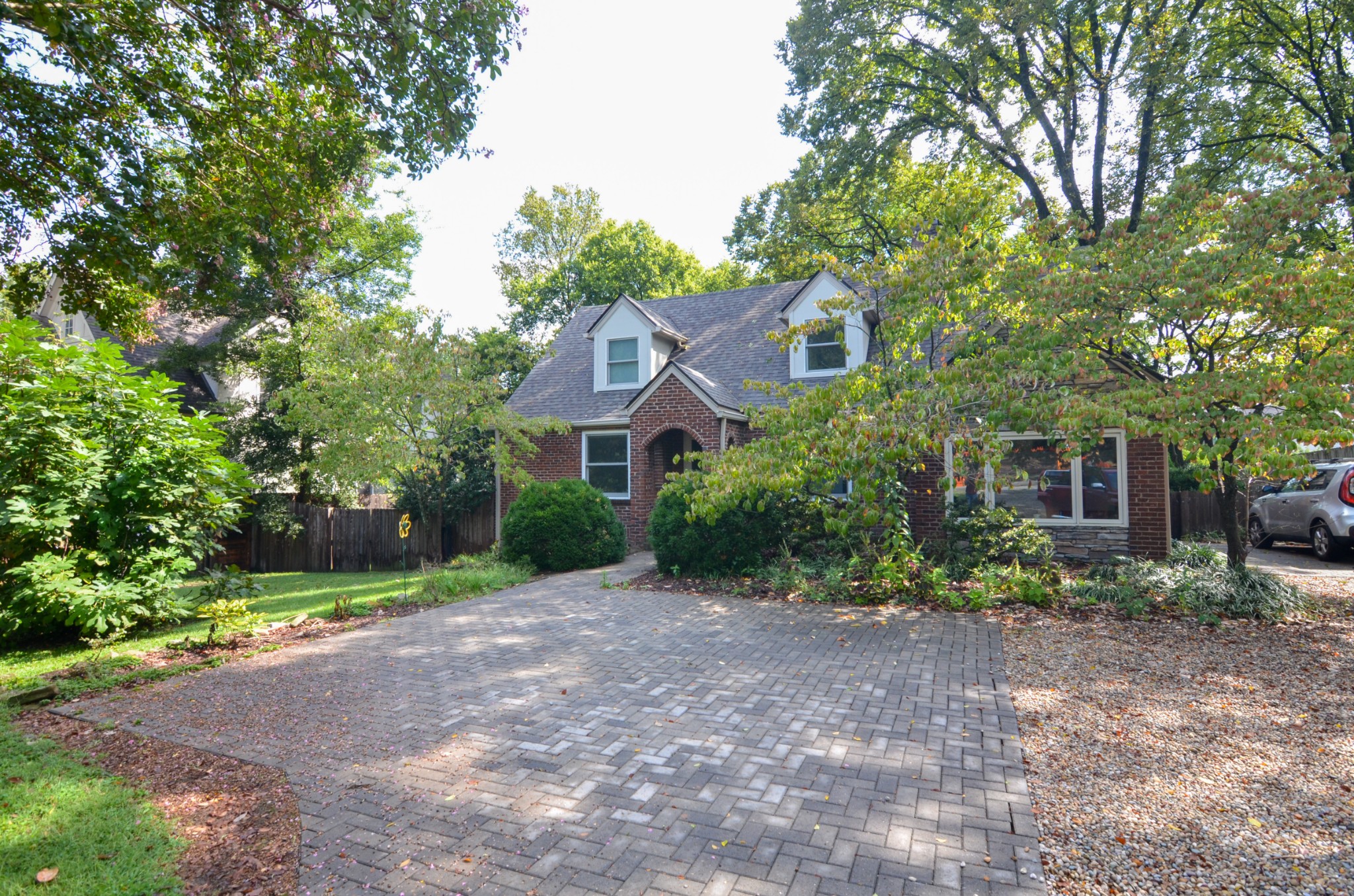 3434 Stokesmont Road Nashville, TN 37215 - Photo 2 of 29 a front view of a house with garden