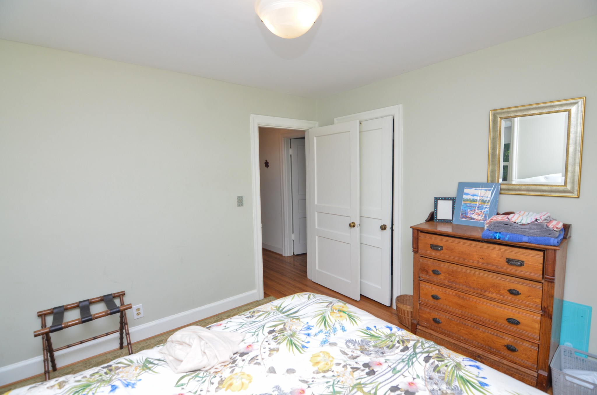 3434 Stokesmont Road Nashville, TN 37215 - Photo 7 of 29 a bedroom with a bed and a dresser in it