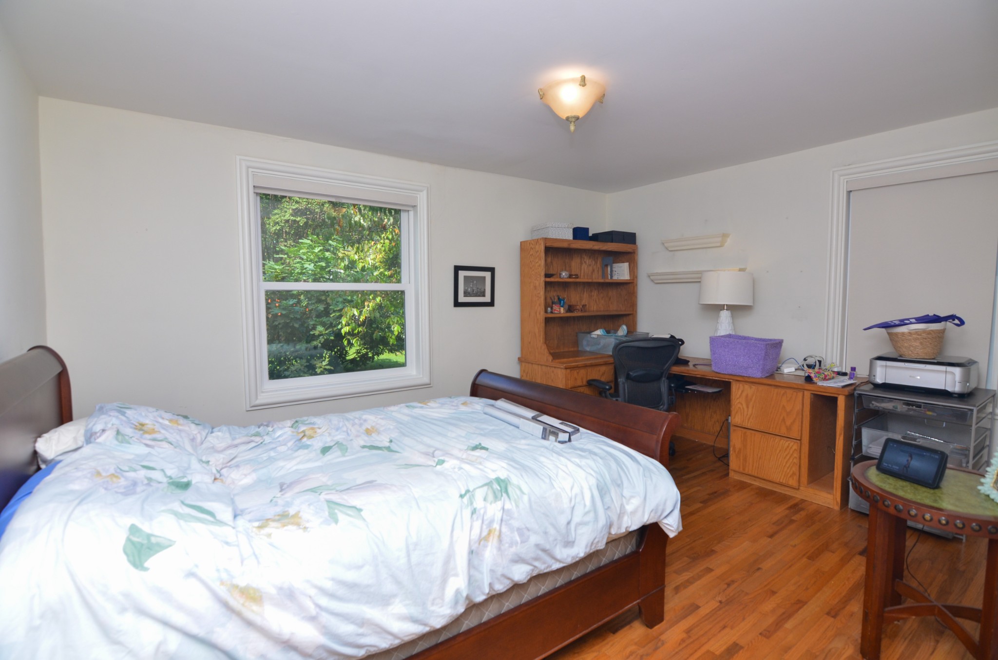 3434 Stokesmont Road Nashville, TN 37215 - Photo 8 of 29 a bedroom with a bed and a desk