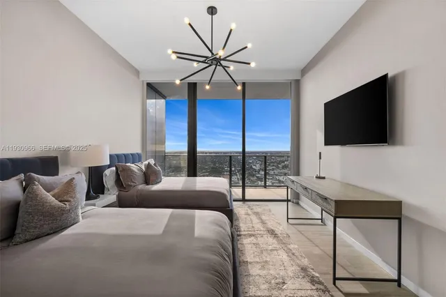 a bathroom with a shower and a sink