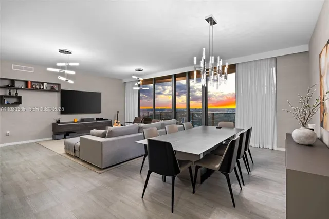 a black and white photo of a very nice looking living room