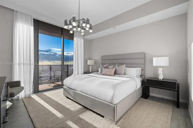 a view of a balcony with chair and wooden floor