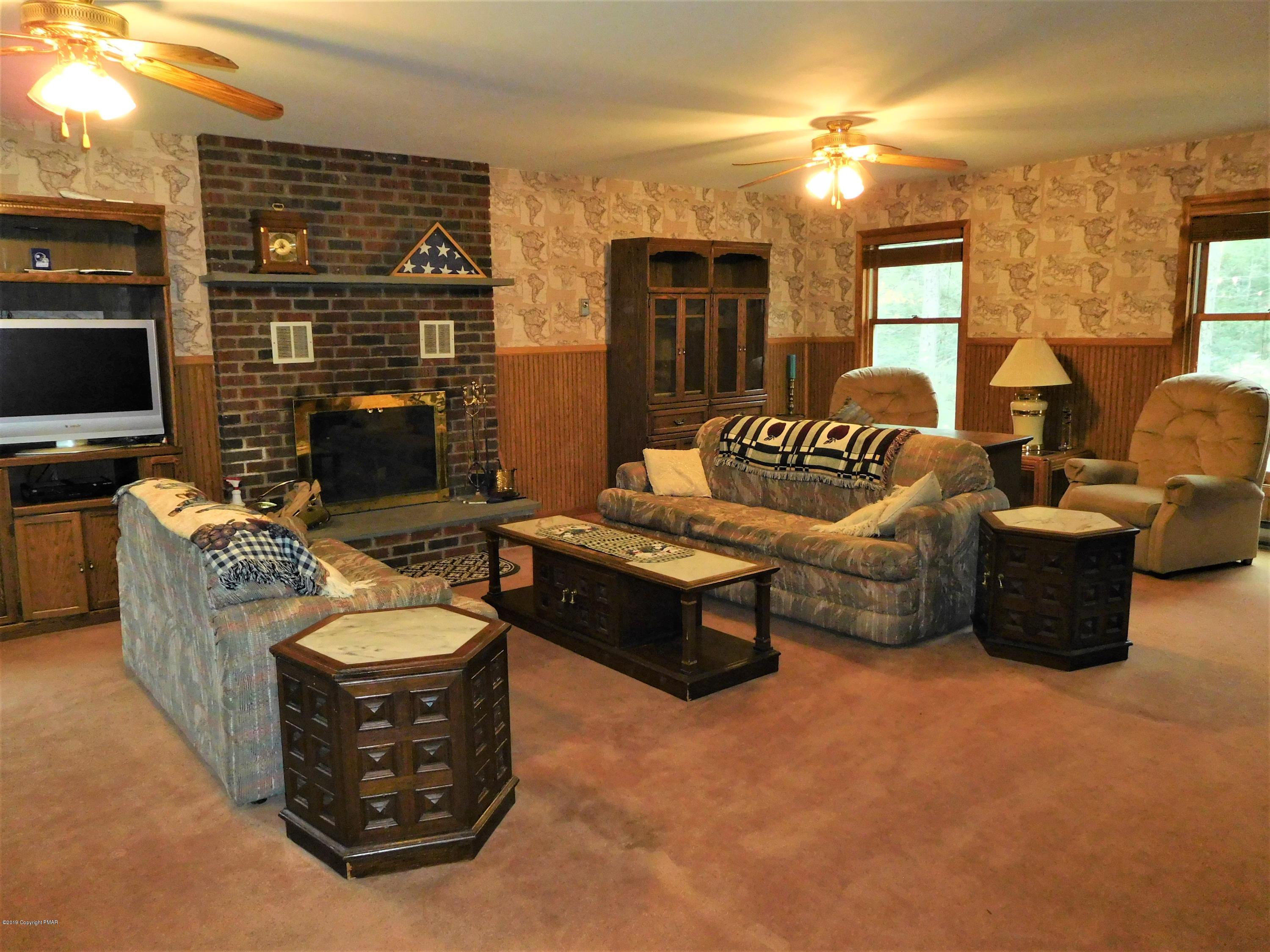 152 Hemlock Road Tannersville, PA 18372 - Photo 3 of 32 family room 2