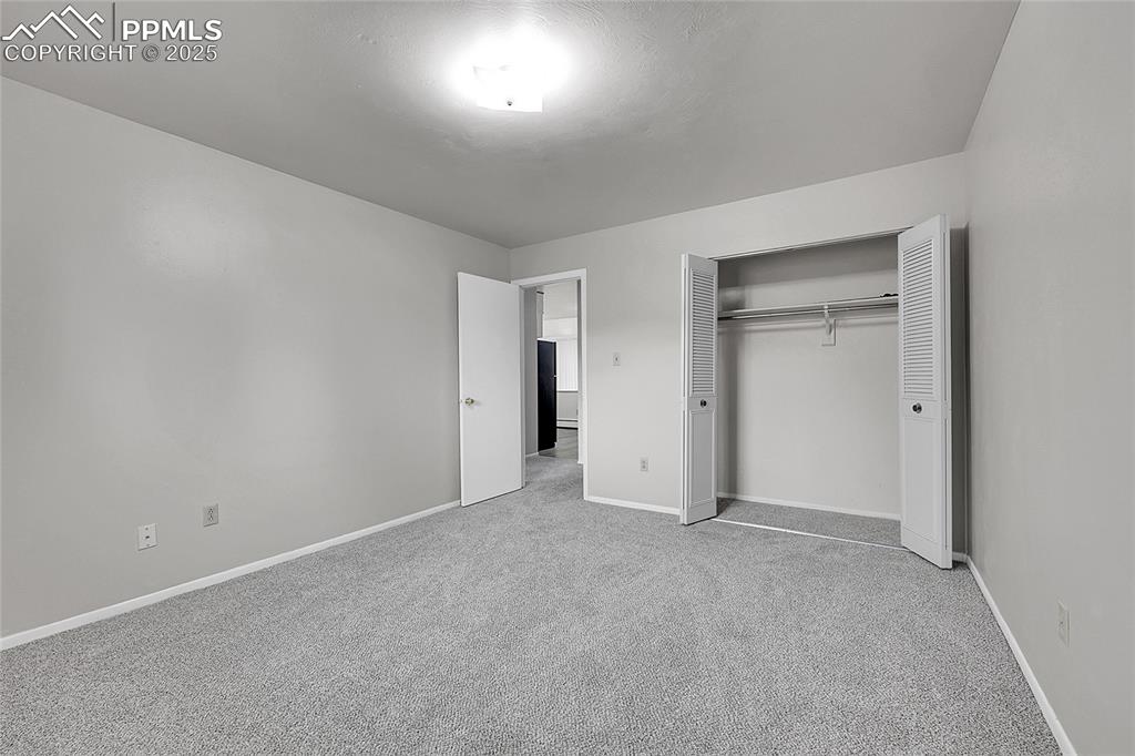 6633 Dublin Loop West, Unit 4 Colorado Springs, CO 80918 - Photo 32 of 33 a view of empty room