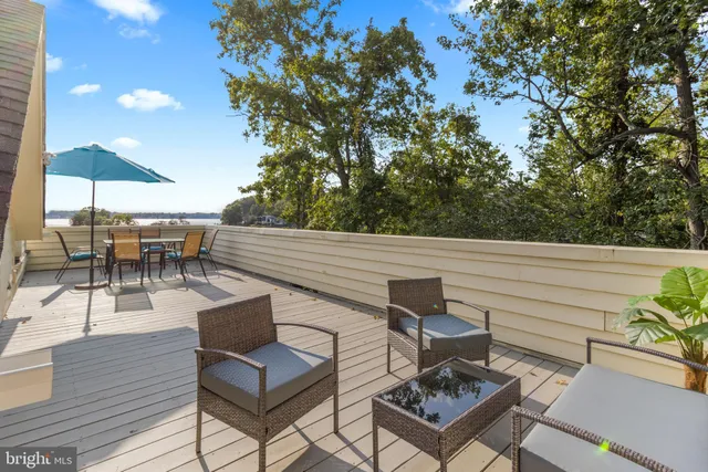 a view of a swimming pool with a lake view