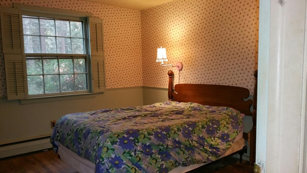 182 Topsfield Road Boxford, MA 01921 - Photo 6 of 8 a bedroom with a bed and a window