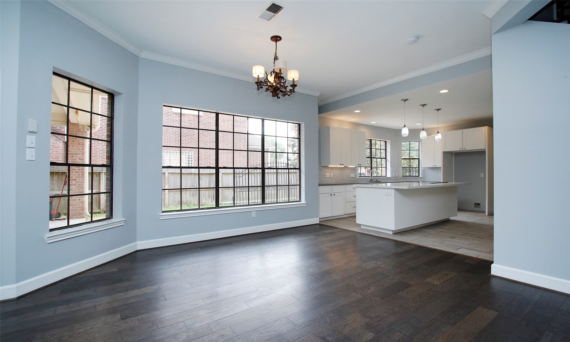 16119 Cochet Spring Drive Spring, TX 77379 - Photo 14 of 26 The kitchen features expansive windows, allowing plenty of natural light to brighten the space, just like much of the home.