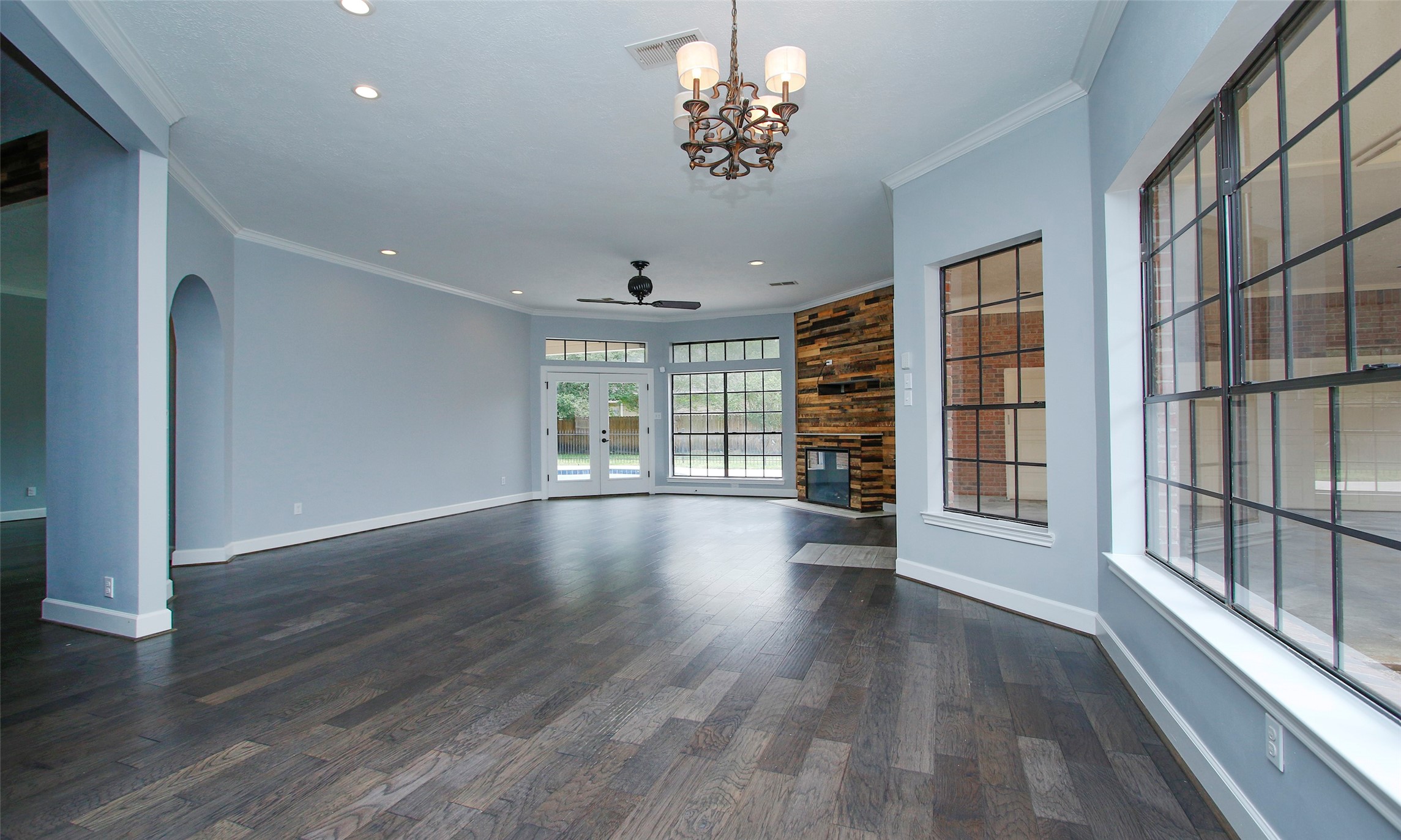 16119 Cochet Spring Drive Spring, TX 77379 - Photo 15 of 26 A view from the kitchen showcases the spacious family room, offering an open and connected living area.