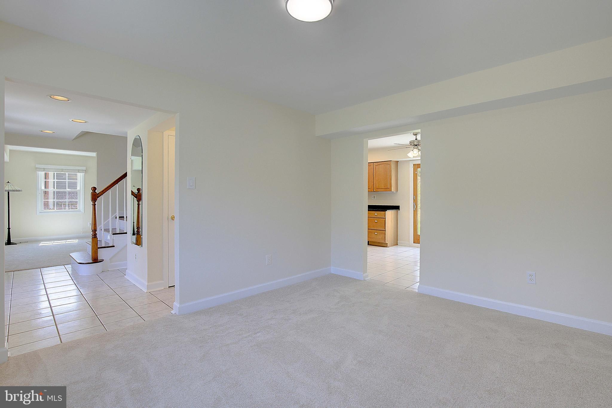 12702 Cedarbrook Lane Laurel, MD 20708 - Photo 13 of 43 an empty room with a bathroom and a window