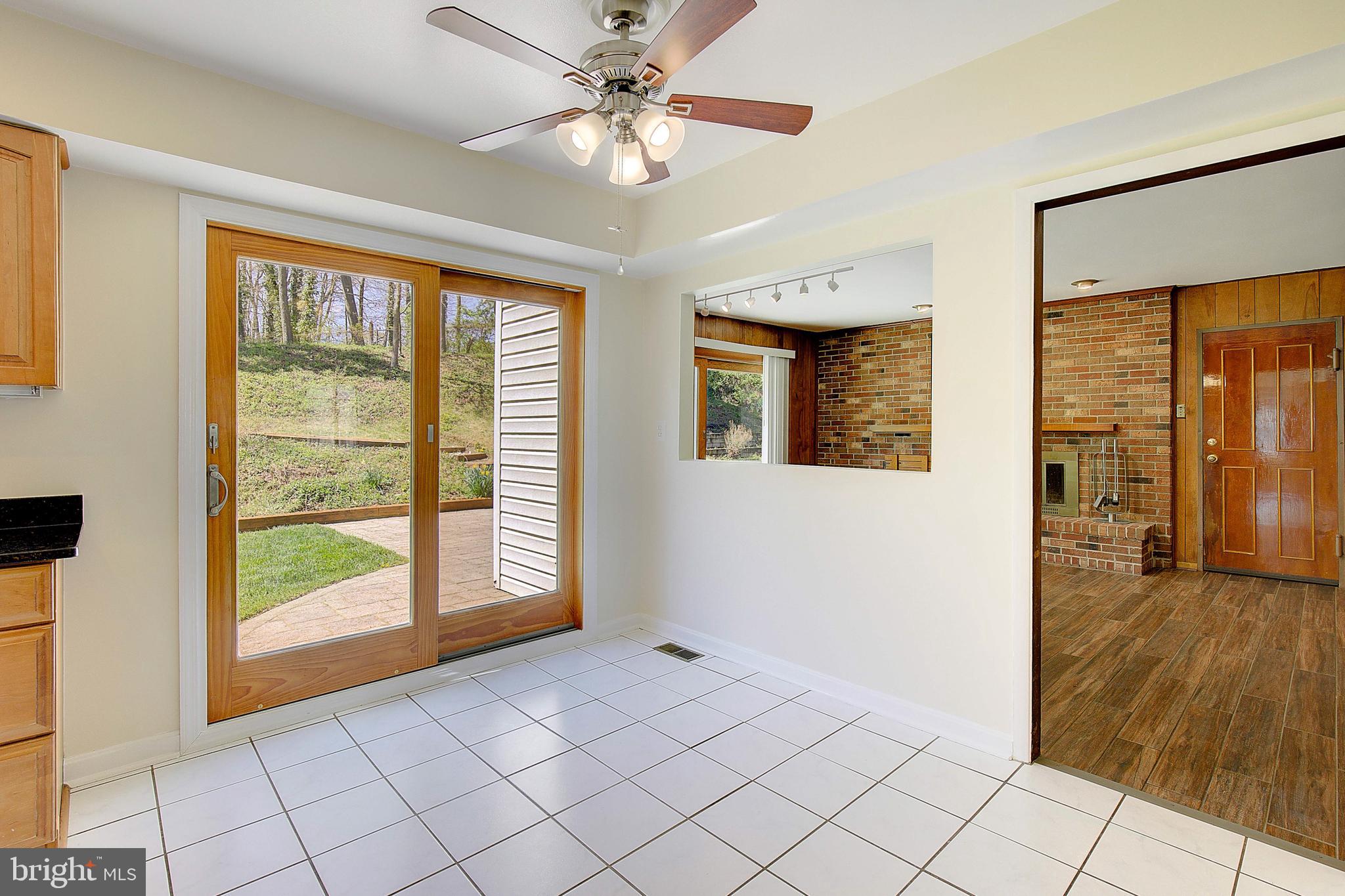 12702 Cedarbrook Lane Laurel, MD 20708 - Photo 15 of 43 wooden floor in an empty room with a window