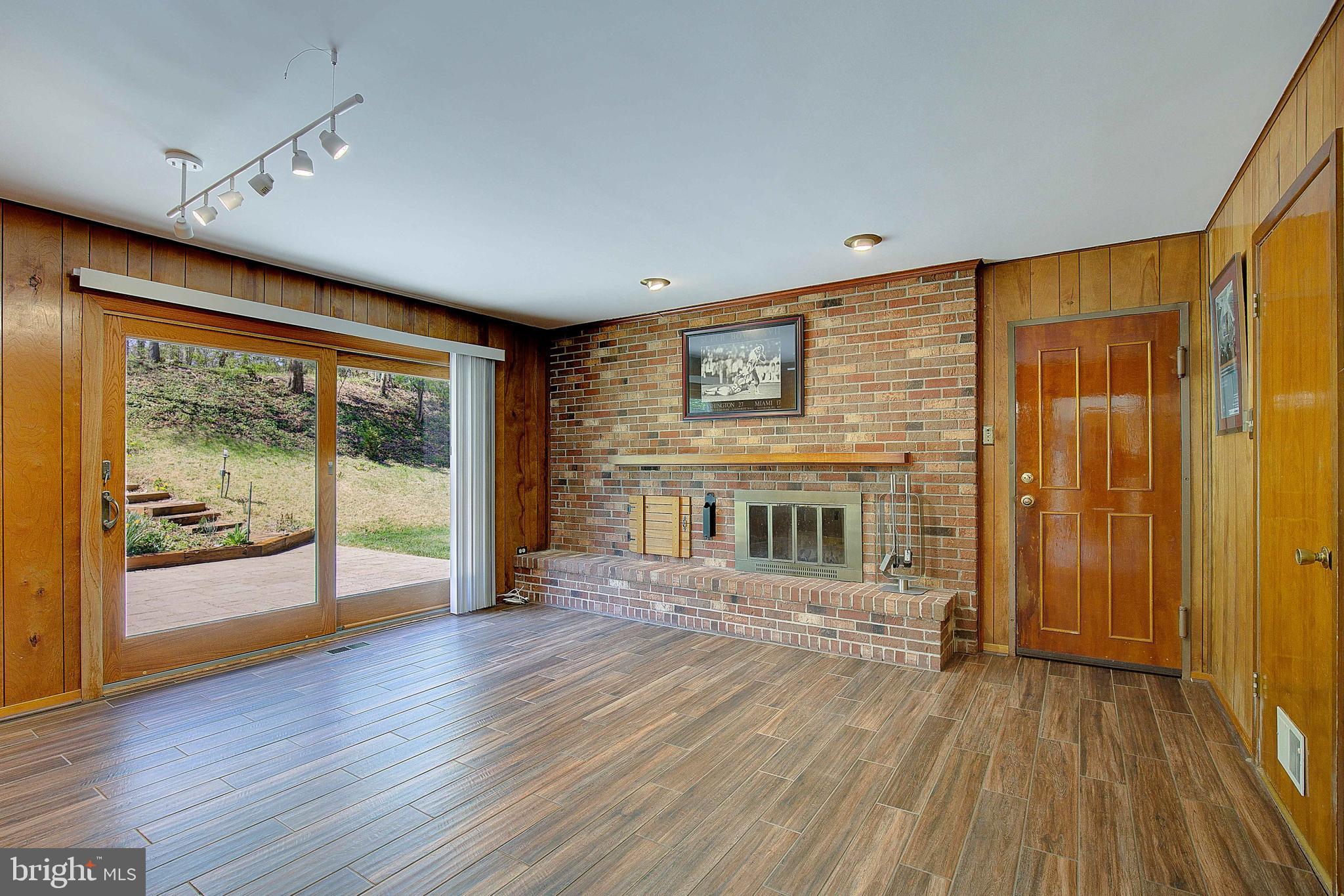 12702 Cedarbrook Lane Laurel, MD 20708 - Photo 17 of 43 wooden floor in an empty room with a window