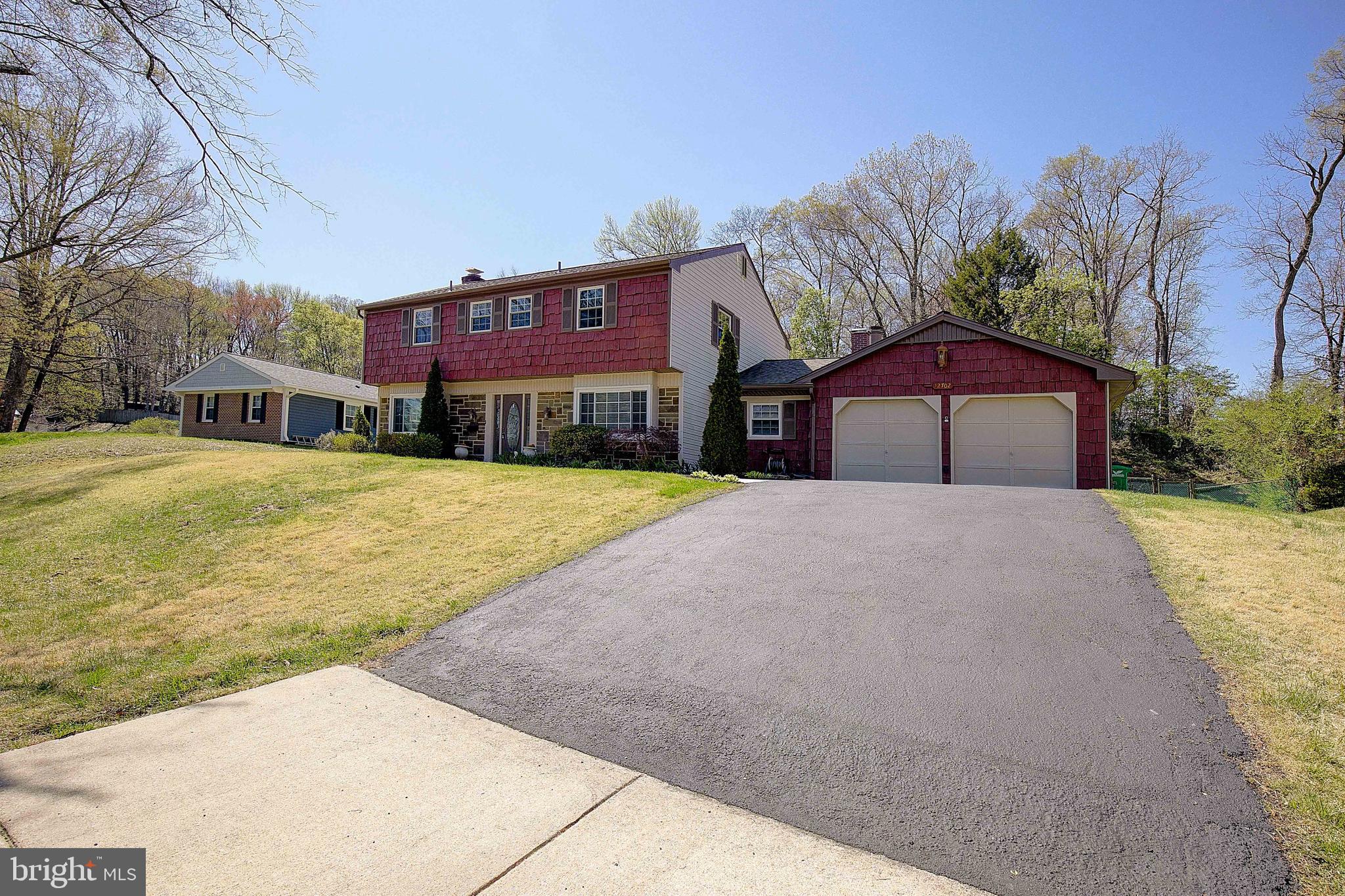 12702 Cedarbrook Lane Laurel, MD 20708 - Photo 2 of 43 a house view with a outdoor space