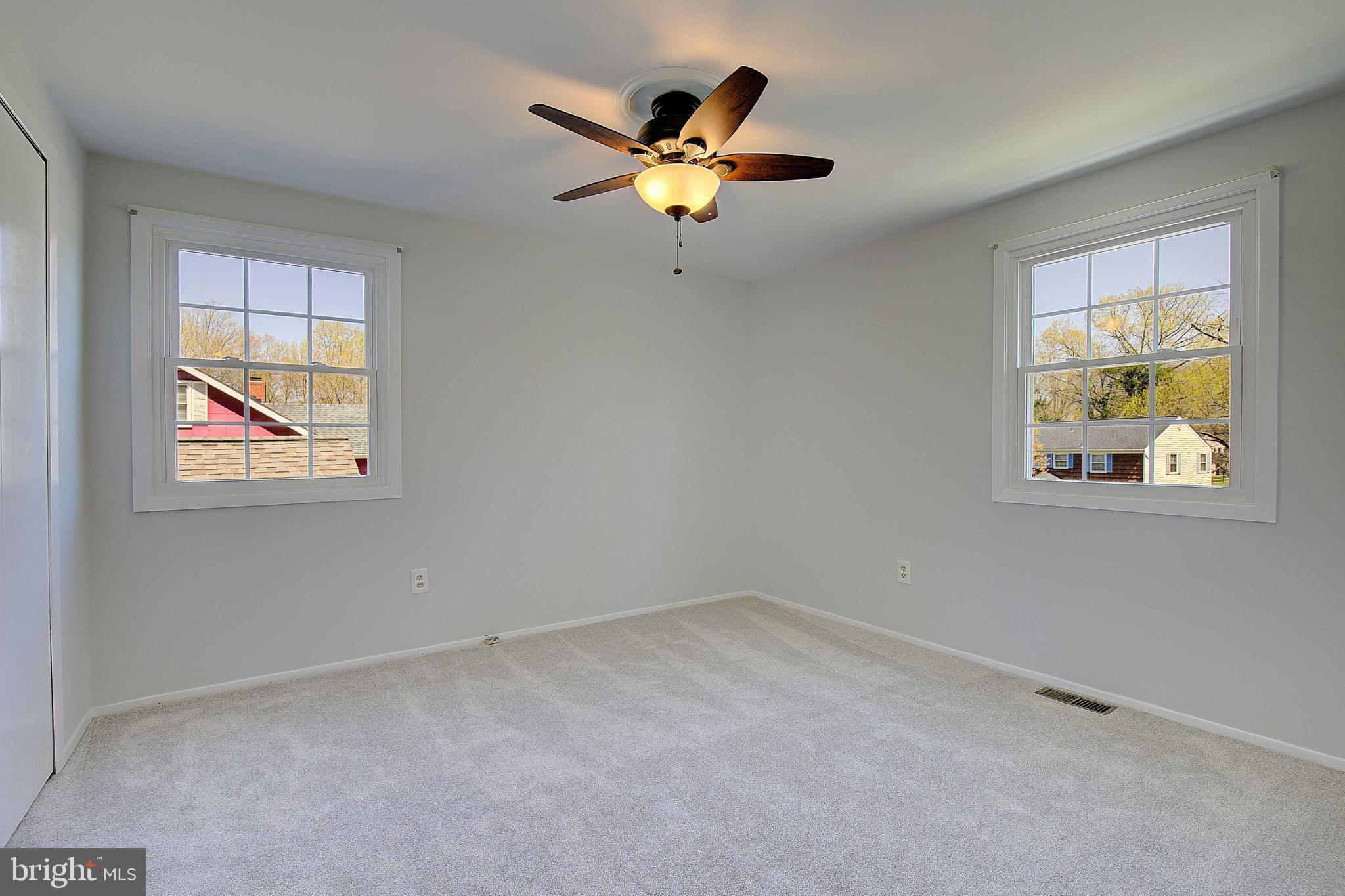 12702 Cedarbrook Lane Laurel, MD 20708 - Photo 21 of 43 a view of an empty room with a window