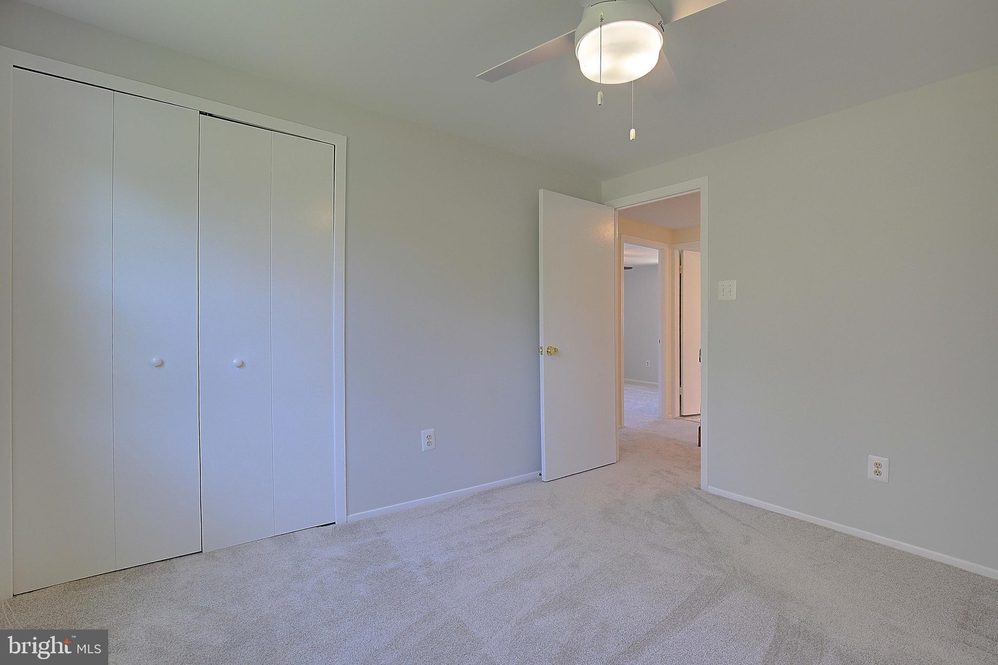 12702 Cedarbrook Lane Laurel, MD 20708 - Photo 27 of 43 a view of an empty room and a window