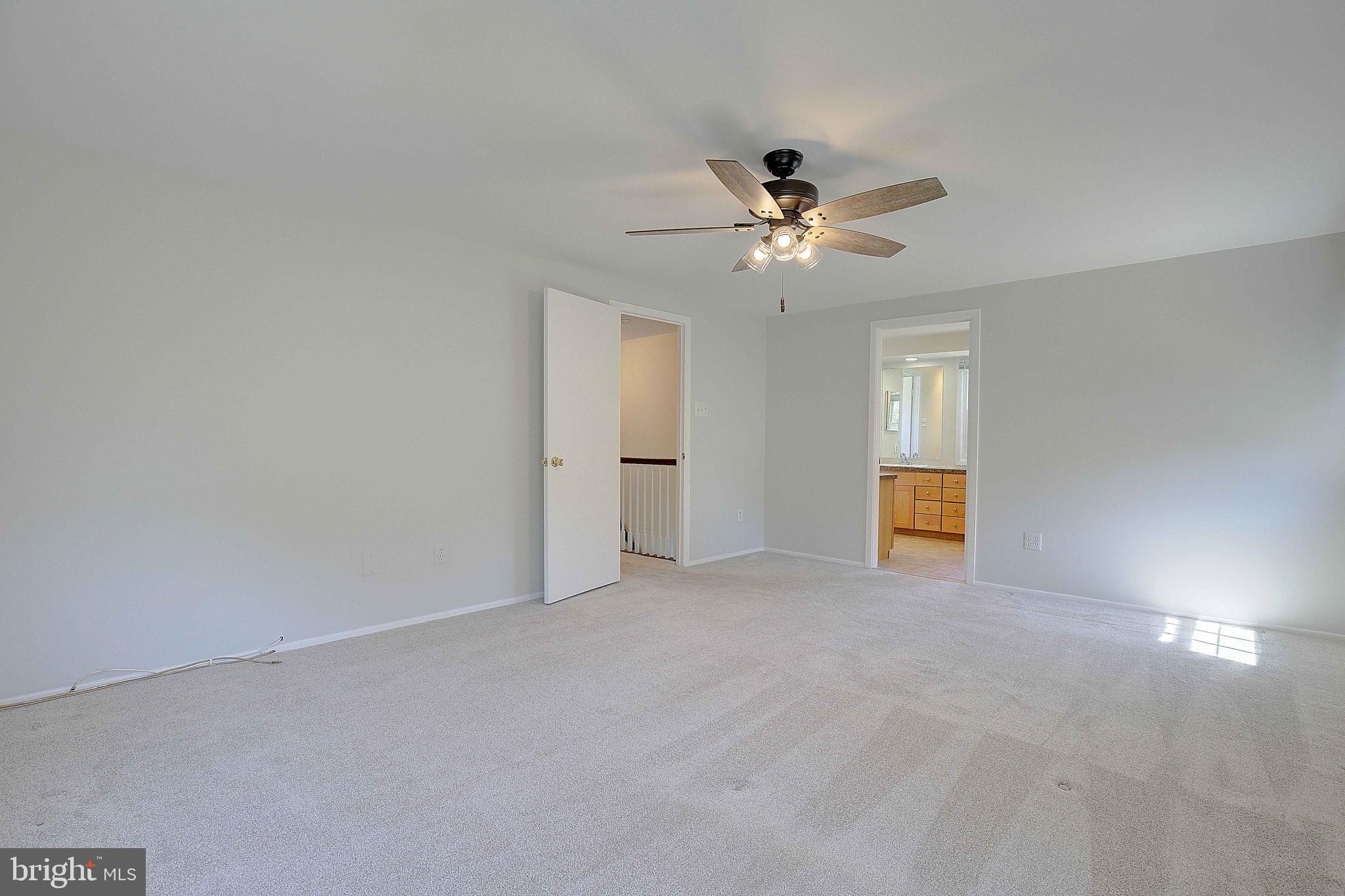 12702 Cedarbrook Lane Laurel, MD 20708 - Photo 31 of 43 a view of an empty room with a window