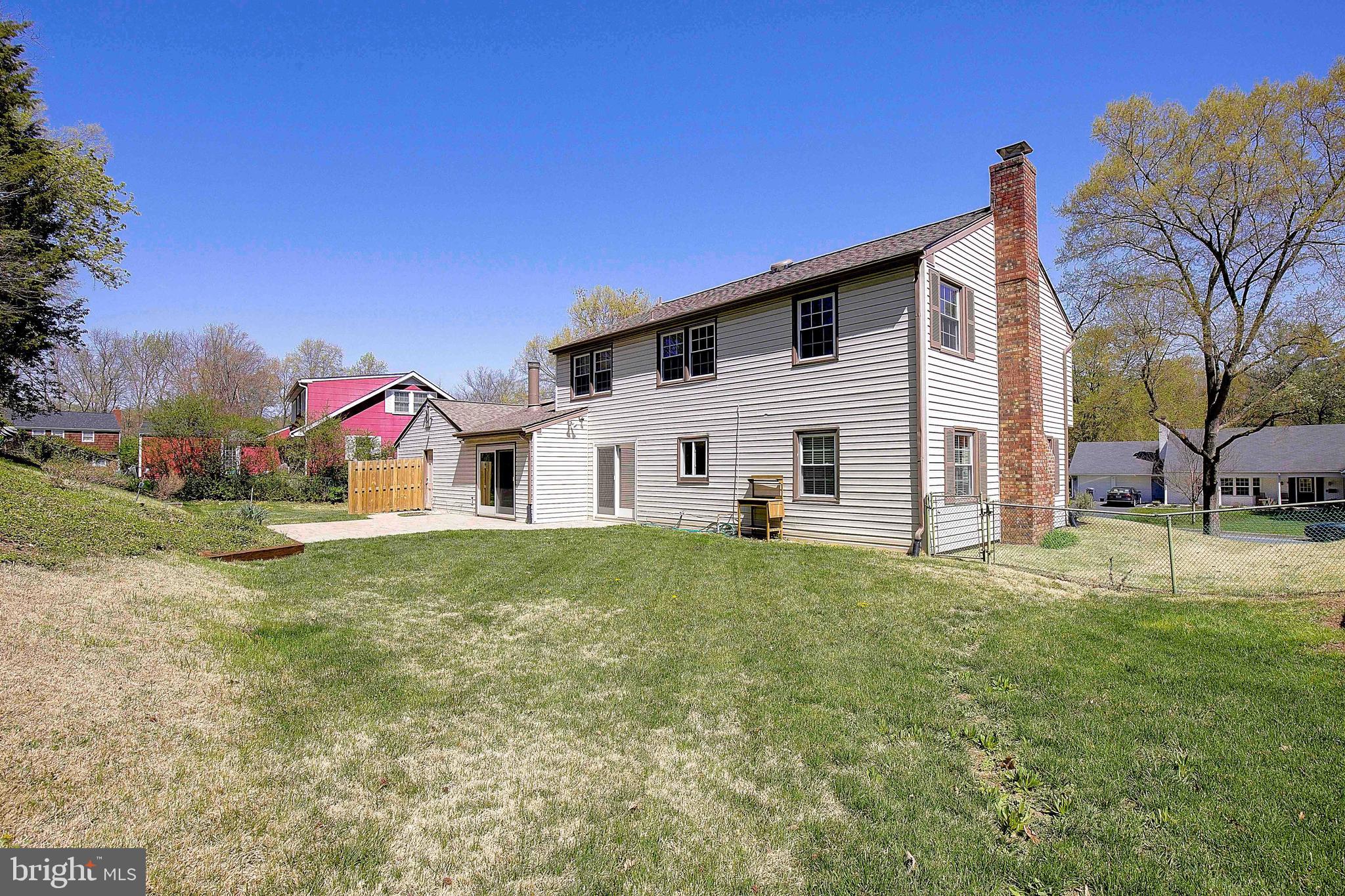 12702 Cedarbrook Lane Laurel, MD 20708 - Photo 39 of 43 a view of a house with a back yard