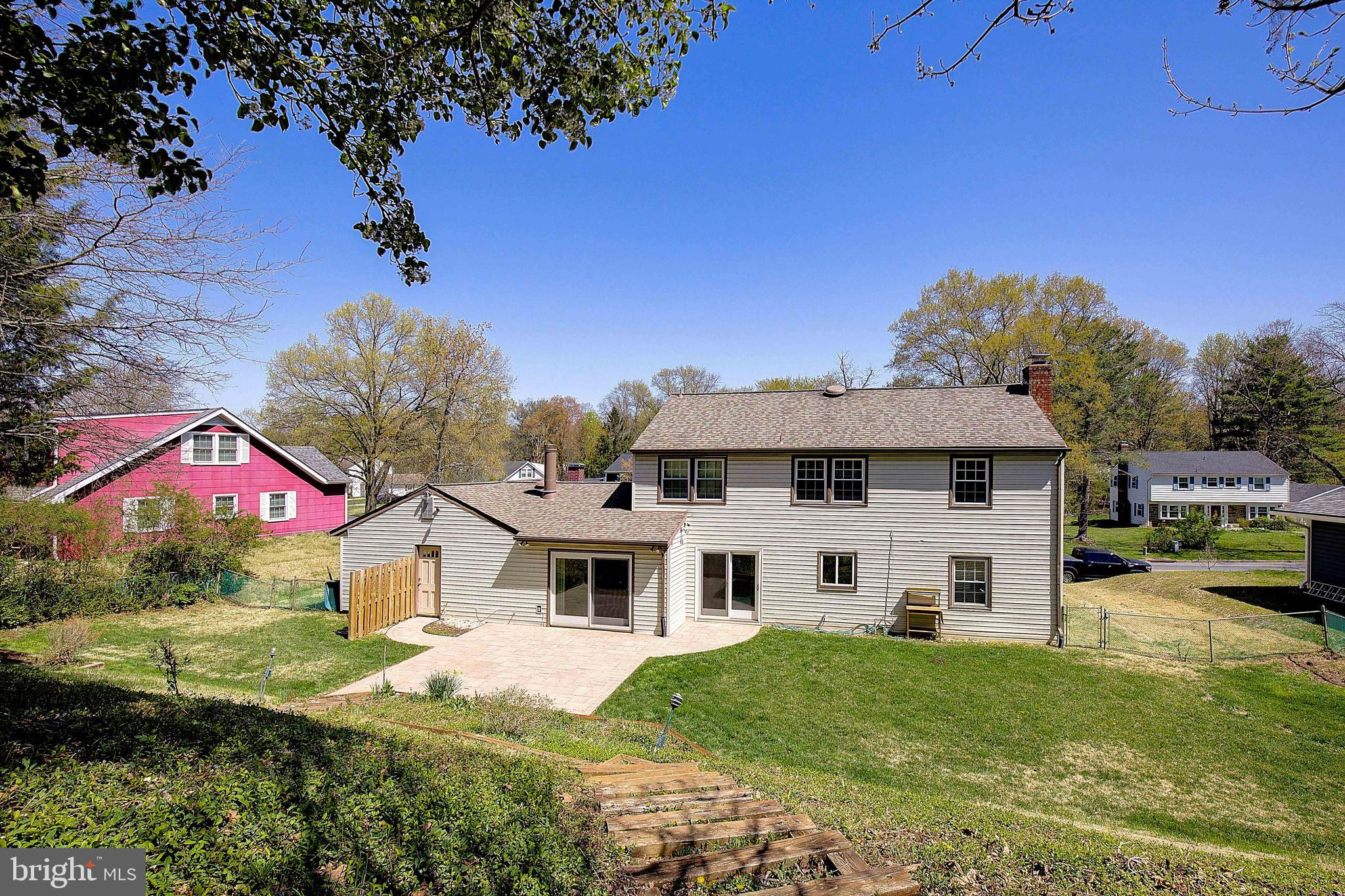 12702 Cedarbrook Lane Laurel, MD 20708 - Photo 43 of 43 a view of a house with a yard