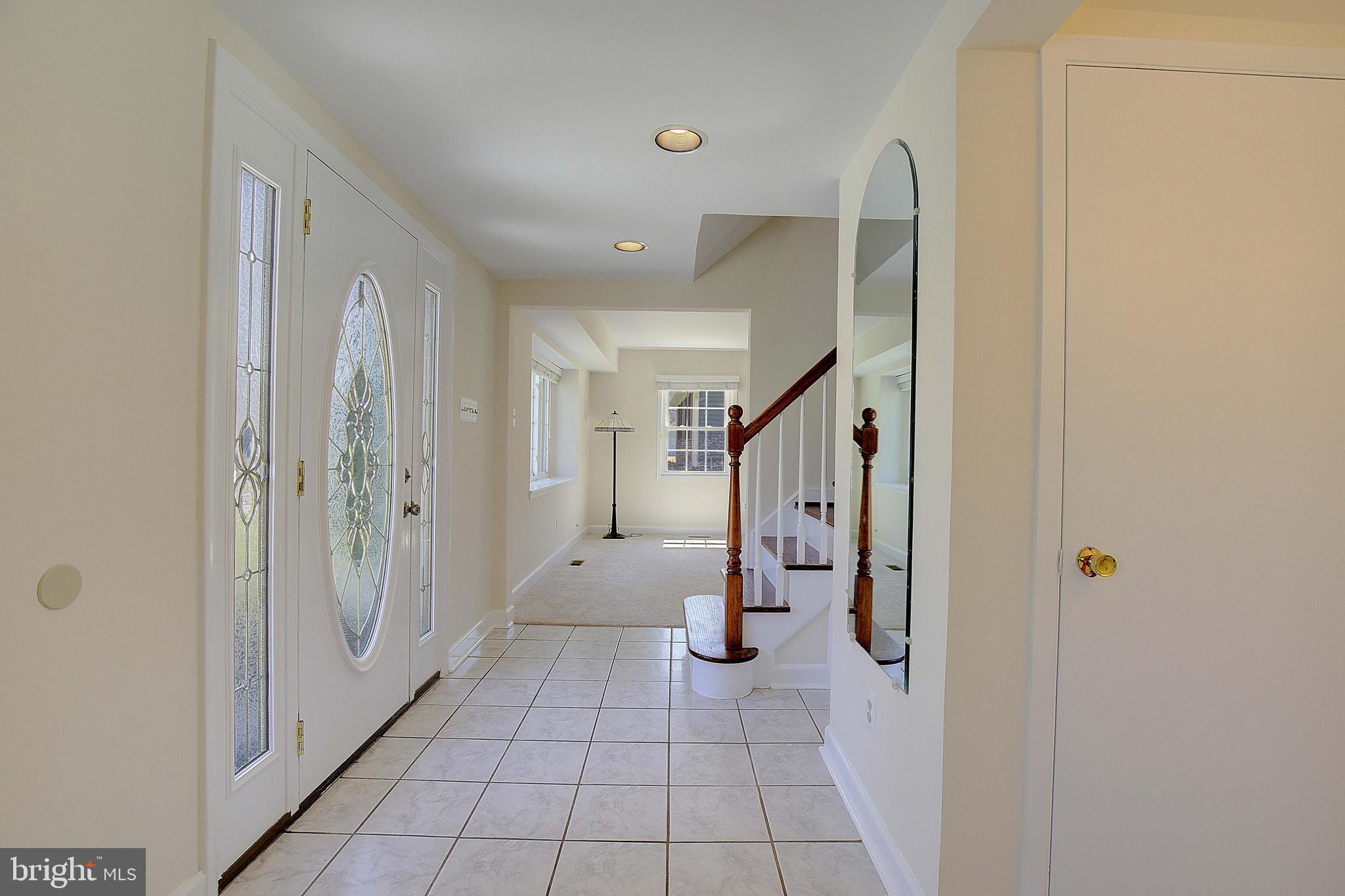 12702 Cedarbrook Lane Laurel, MD 20708 - Photo 5 of 43 a view of a hallway with closet and entryway