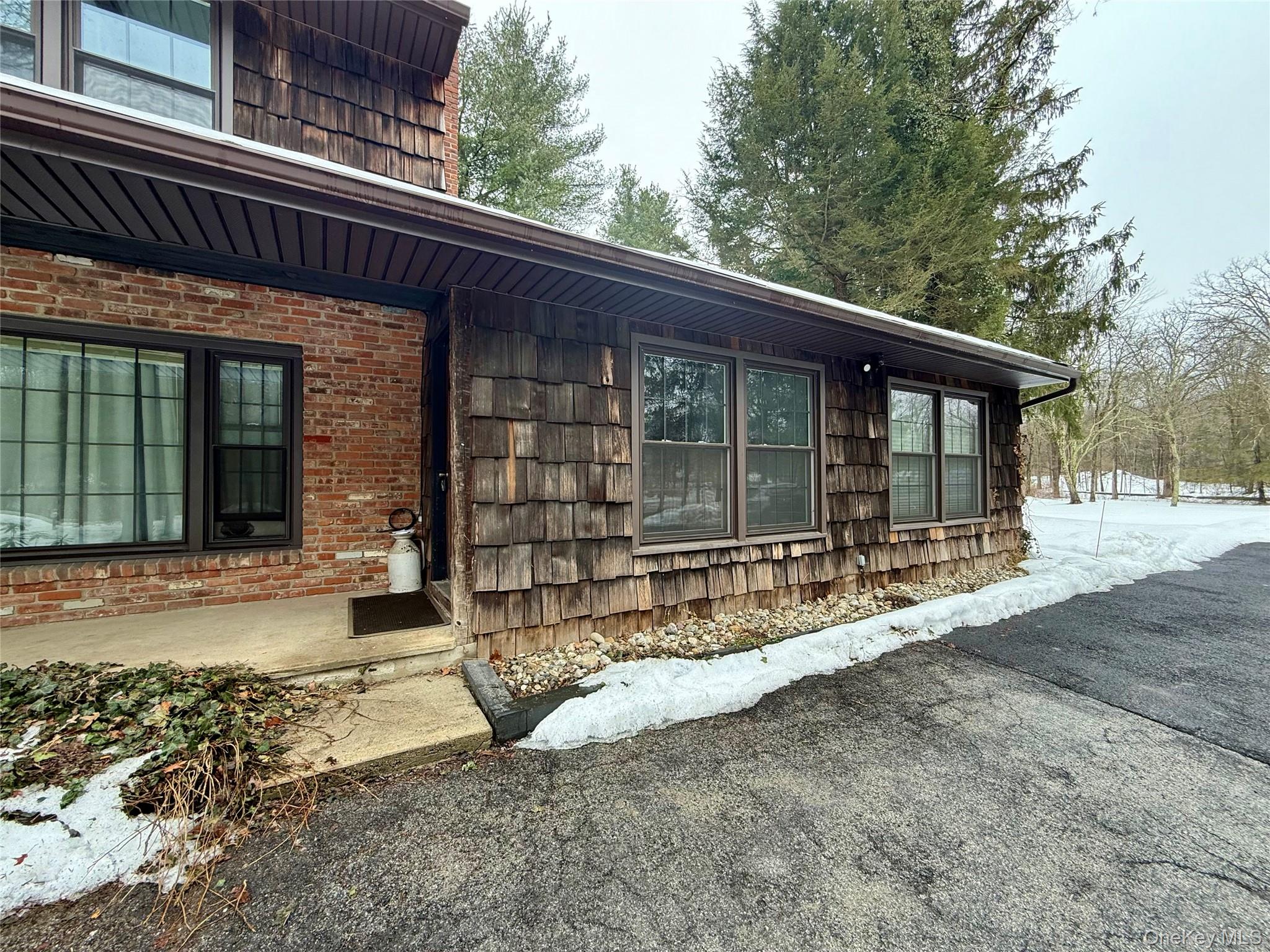 102 Fallkill Road, Unit 1W Hyde Park, NY 12538 - Photo 19 of 21 a view of a house with a outdoor space