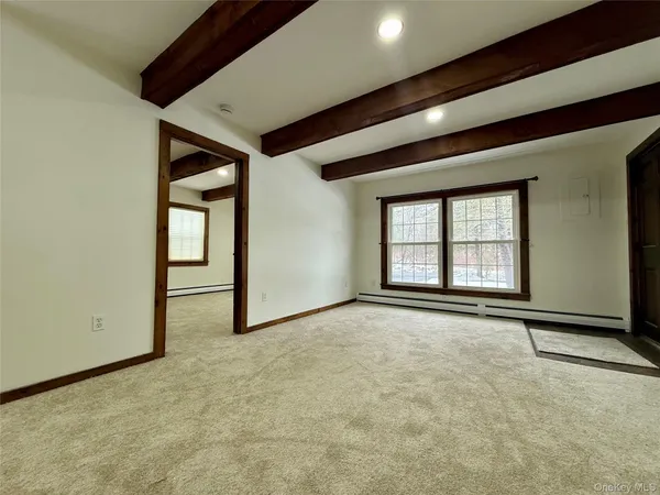 an empty room with windows