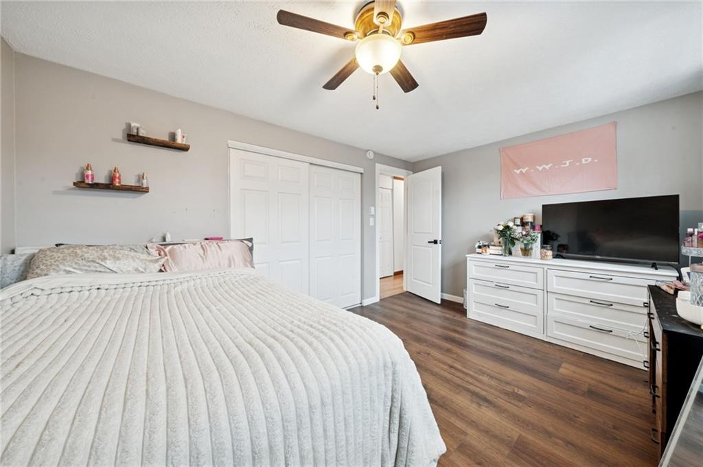 440 Lippencott Run Road Waynesburg, PA 15370 - Photo 14 of 39 a bedroom with a bed and a flat screen tv