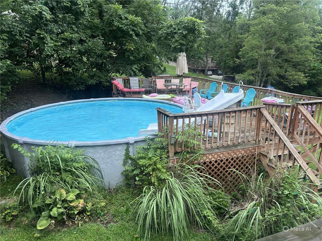 440 Lippencott Run Road Waynesburg, PA 15370 - Photo 28 of 39 a terrace with outdoor seating and trees