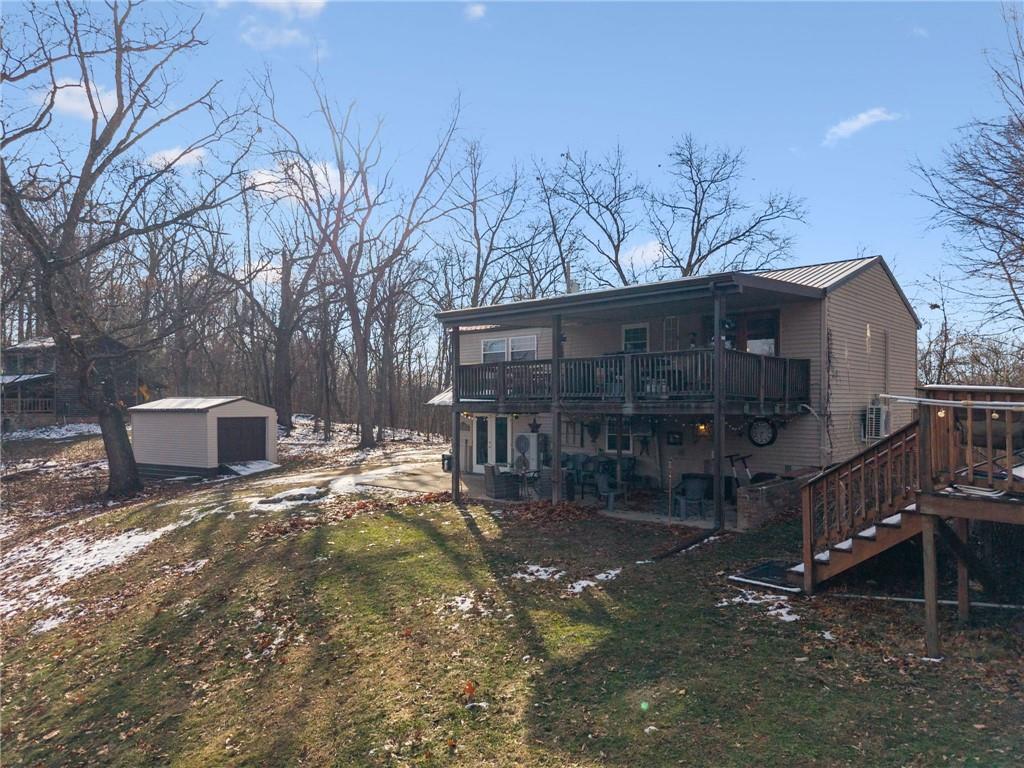 440 Lippencott Run Road Waynesburg, PA 15370 - Photo 35 of 39 a view of a house with backyard and sitting area