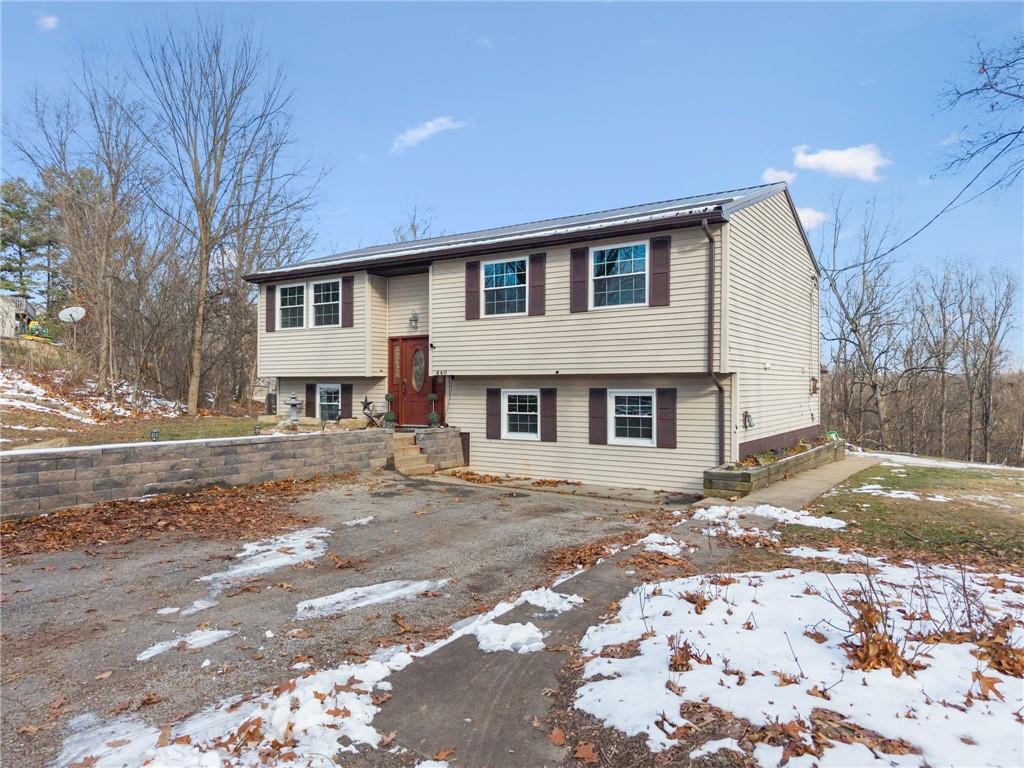 440 Lippencott Run Road Waynesburg, PA 15370 - Photo 37 of 39 a front view of a house with a yard