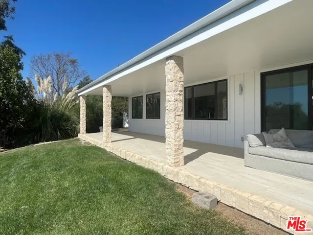 a house with yard in front of it