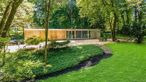 a backyard of a house with seating space