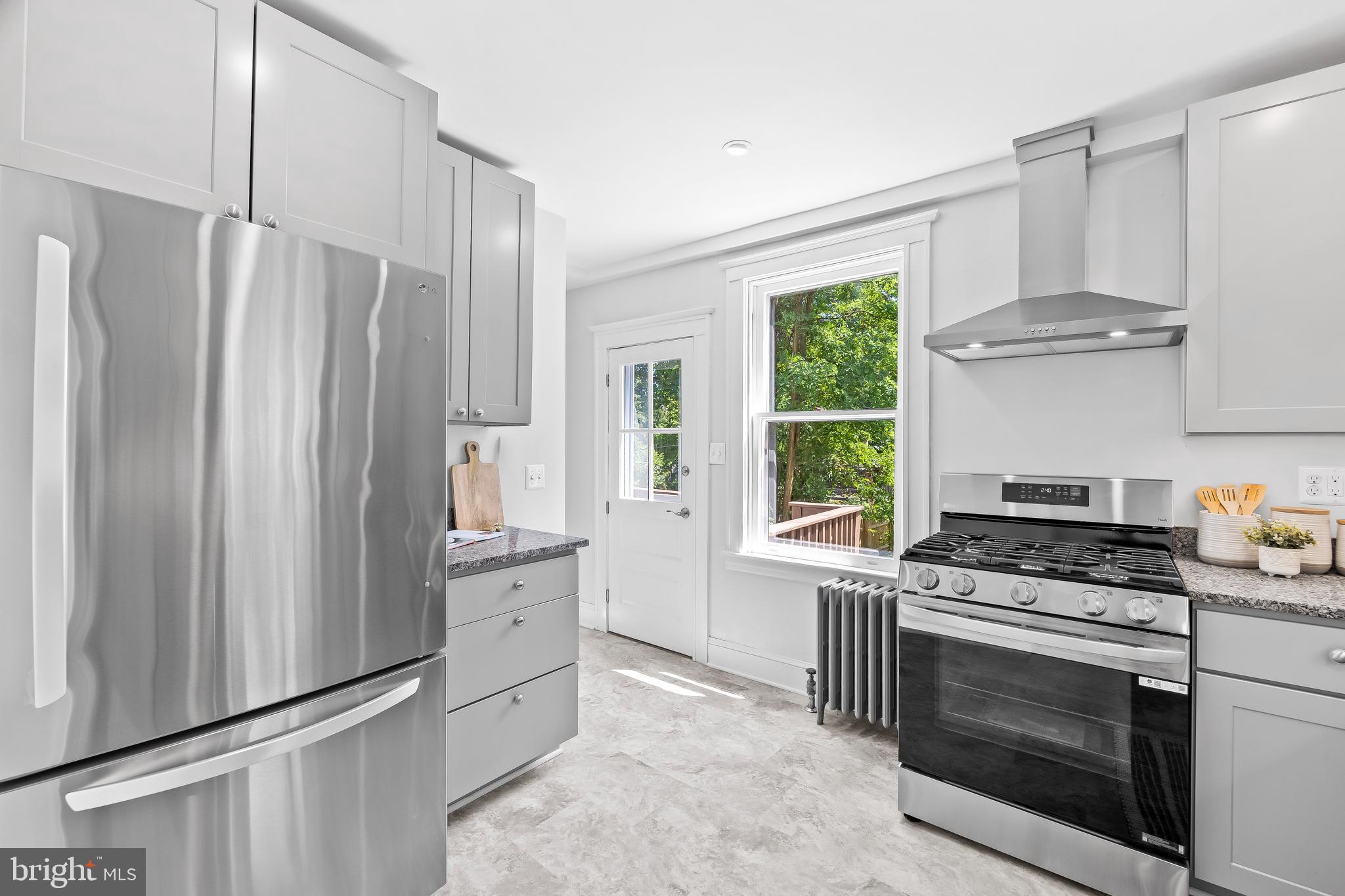503 Orkney Road Baltimore, MD 21212 - Photo 15 of 43 Stainless steel appliances and vinyl flooring