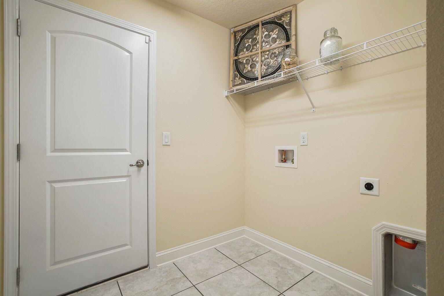 133 Southwest Sea Lion Road Port St. Lucie, FL 34953 - Photo 16 of 18 Laundry