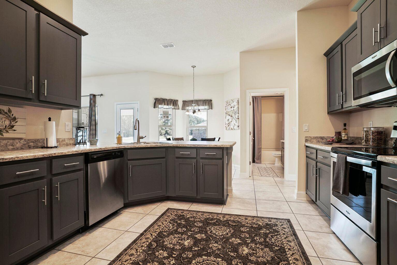 133 Southwest Sea Lion Road Port St. Lucie, FL 34953 - Photo 7 of 18 Kitchen