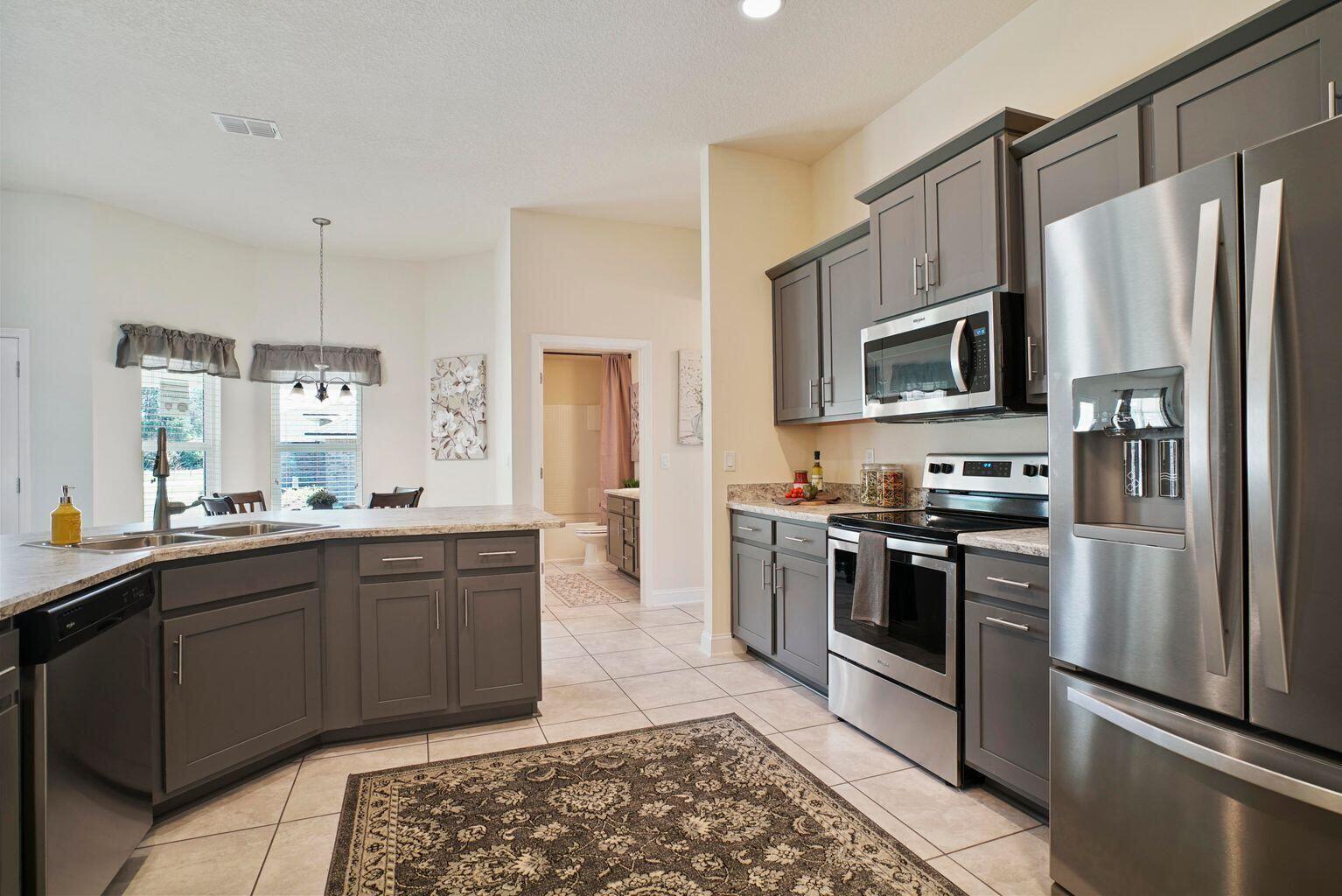 133 Southwest Sea Lion Road Port St. Lucie, FL 34953 - Photo 8 of 18 Kitchen