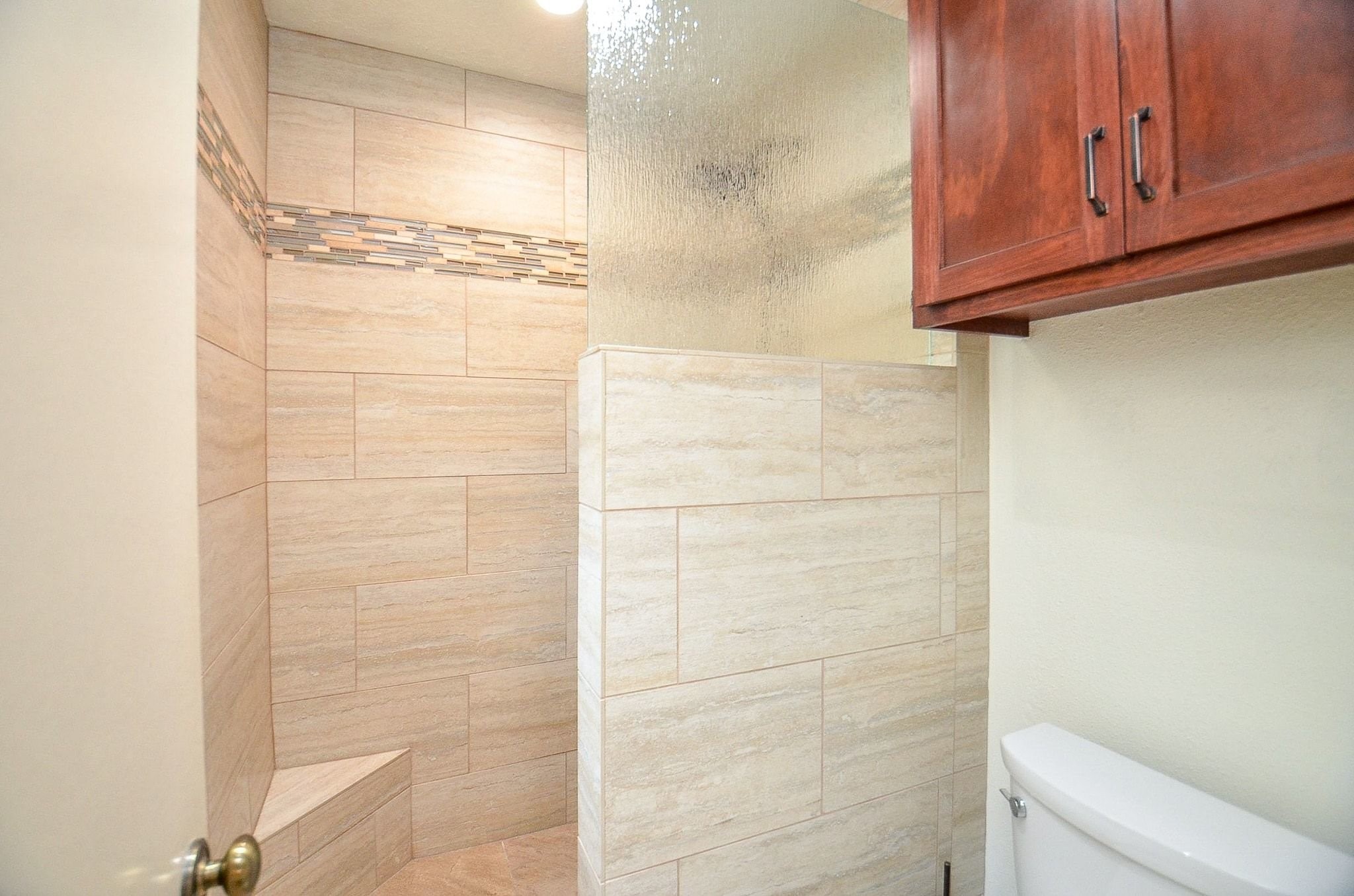 22810 John Rolfe Lane Katy, TX 77449 - Photo 13 of 20 a bathroom with a shower and a toilet