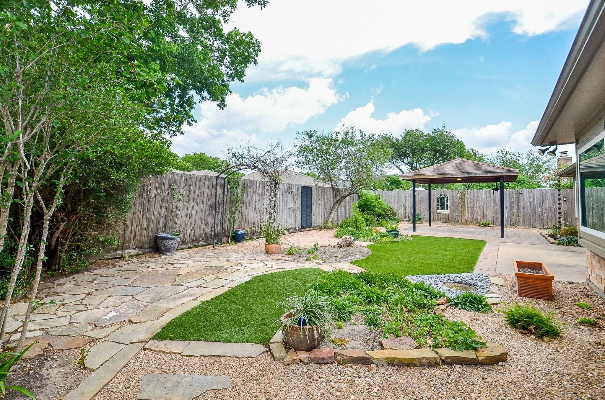 22810 John Rolfe Lane Katy, TX 77449 - Photo 20 of 20 a view of a house with a yard and sitting area