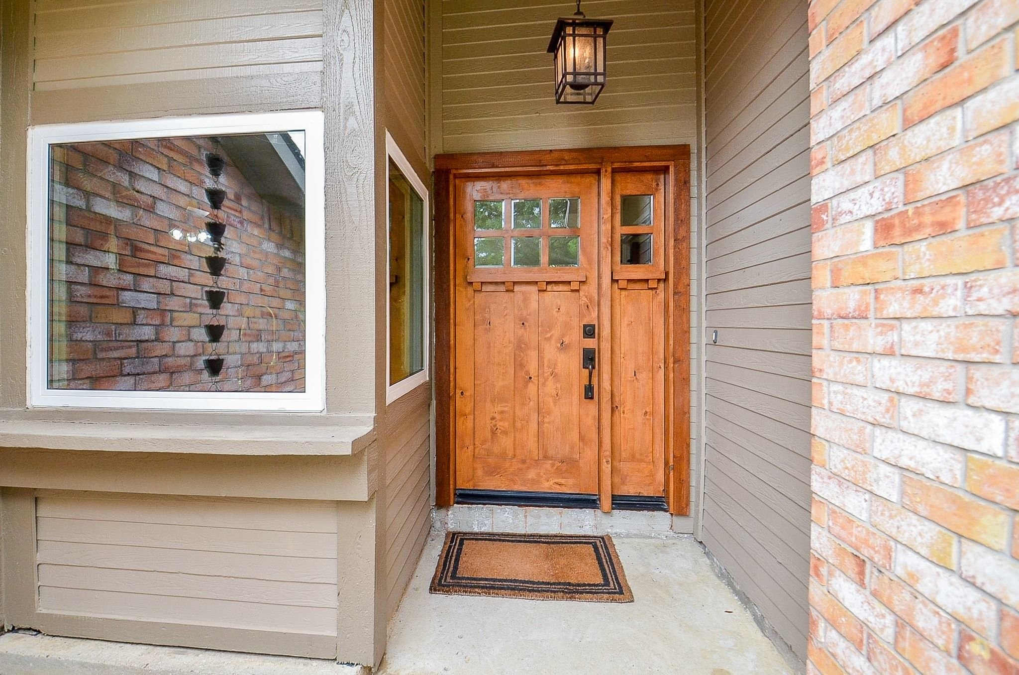 22810 John Rolfe Lane Katy, TX 77449 - Photo 2 of 20 a view of backyard with a door and a outdoor space