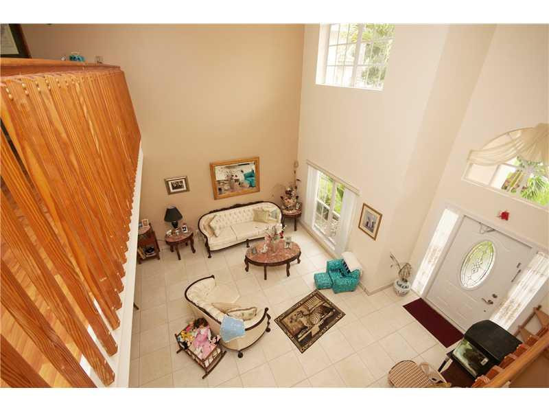 10154 Aqua Vista Way Boca Raton, FL 33428 - Photo 3 of 22 a living room with furniture and rug