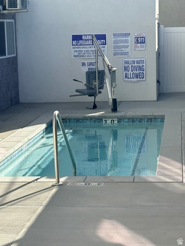 2101 North Main Street, Unit 309 Sunset, UT 84015 - Photo 17 of 17 View of swimming pool with a pool