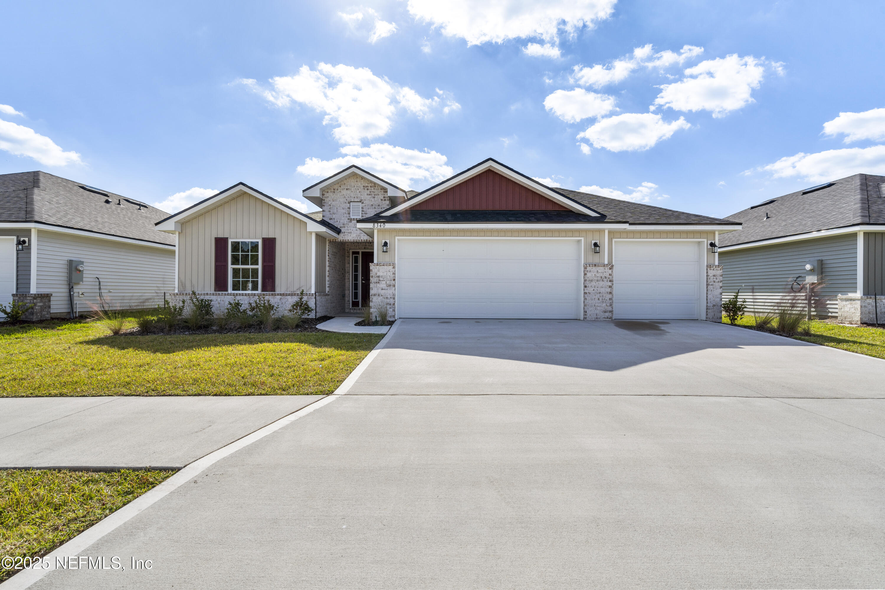 8340 Helmsley Boulevard Jacksonville, FL 32219 - Photo 28 of 56 a view of a house with a yard and a garden