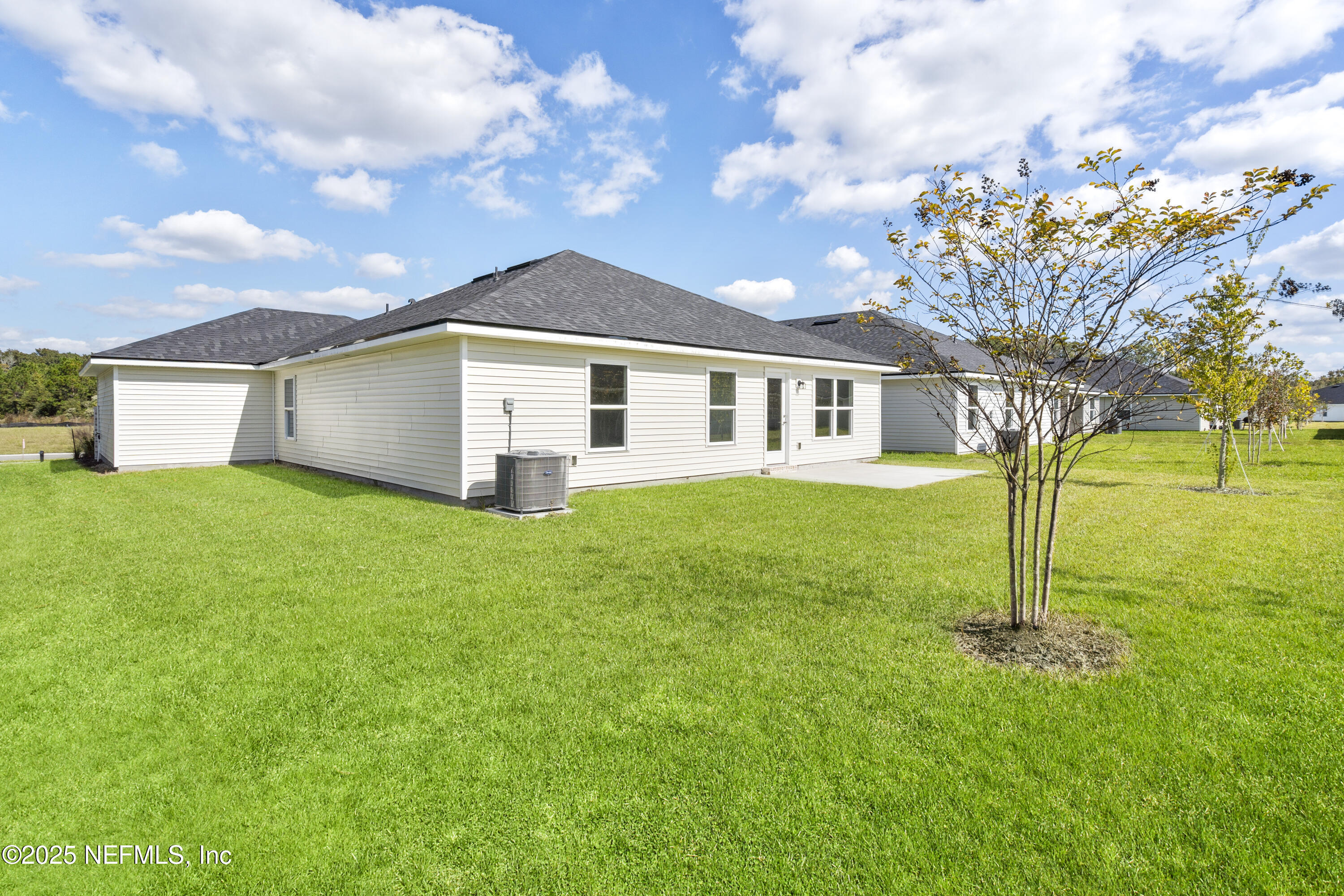 8340 Helmsley Boulevard Jacksonville, FL 32219 - Photo 34 of 56 a front view of house with yard and green space