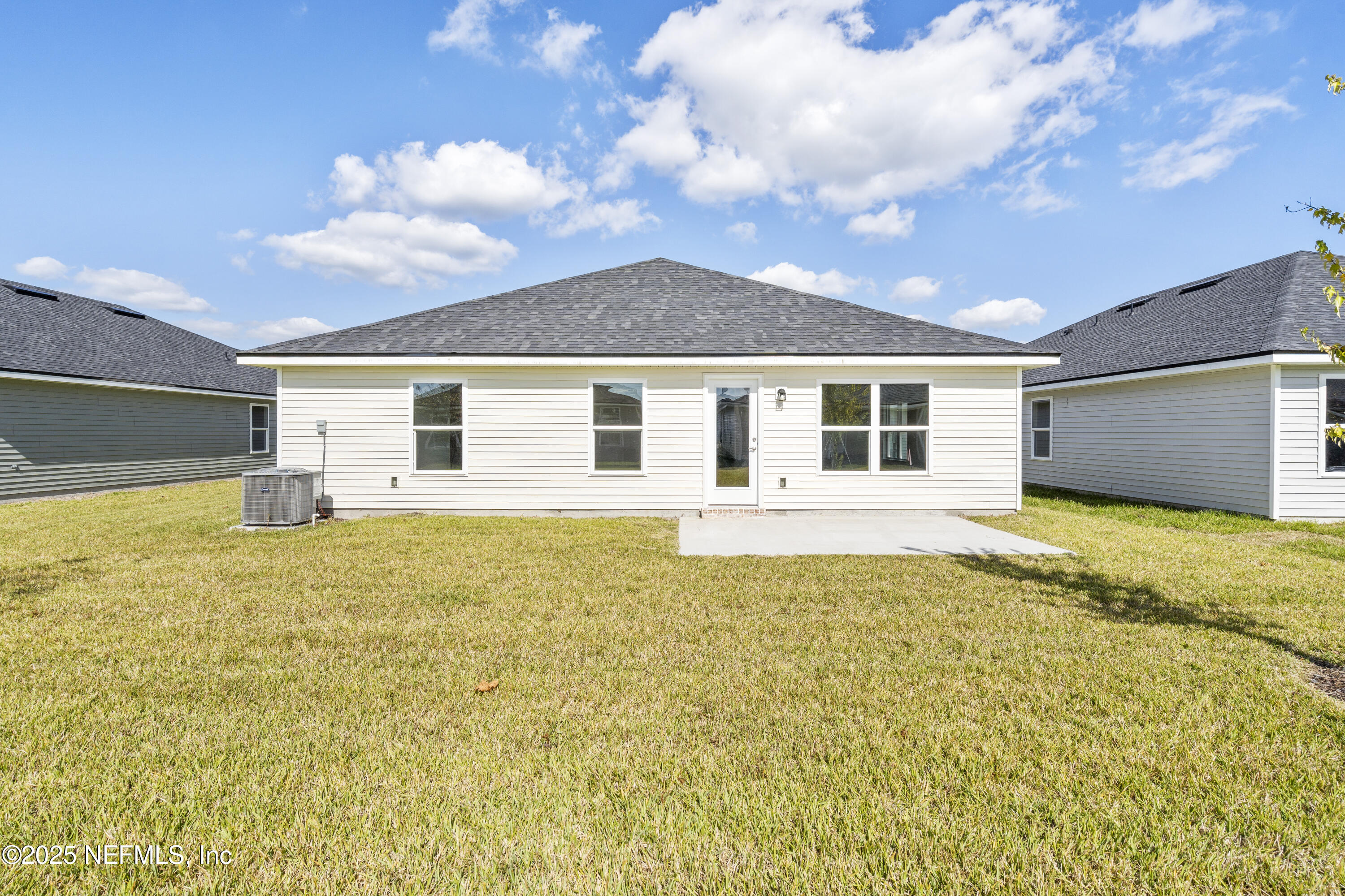 8340 Helmsley Boulevard Jacksonville, FL 32219 - Photo 35 of 56 a view of a house with a swimming pool