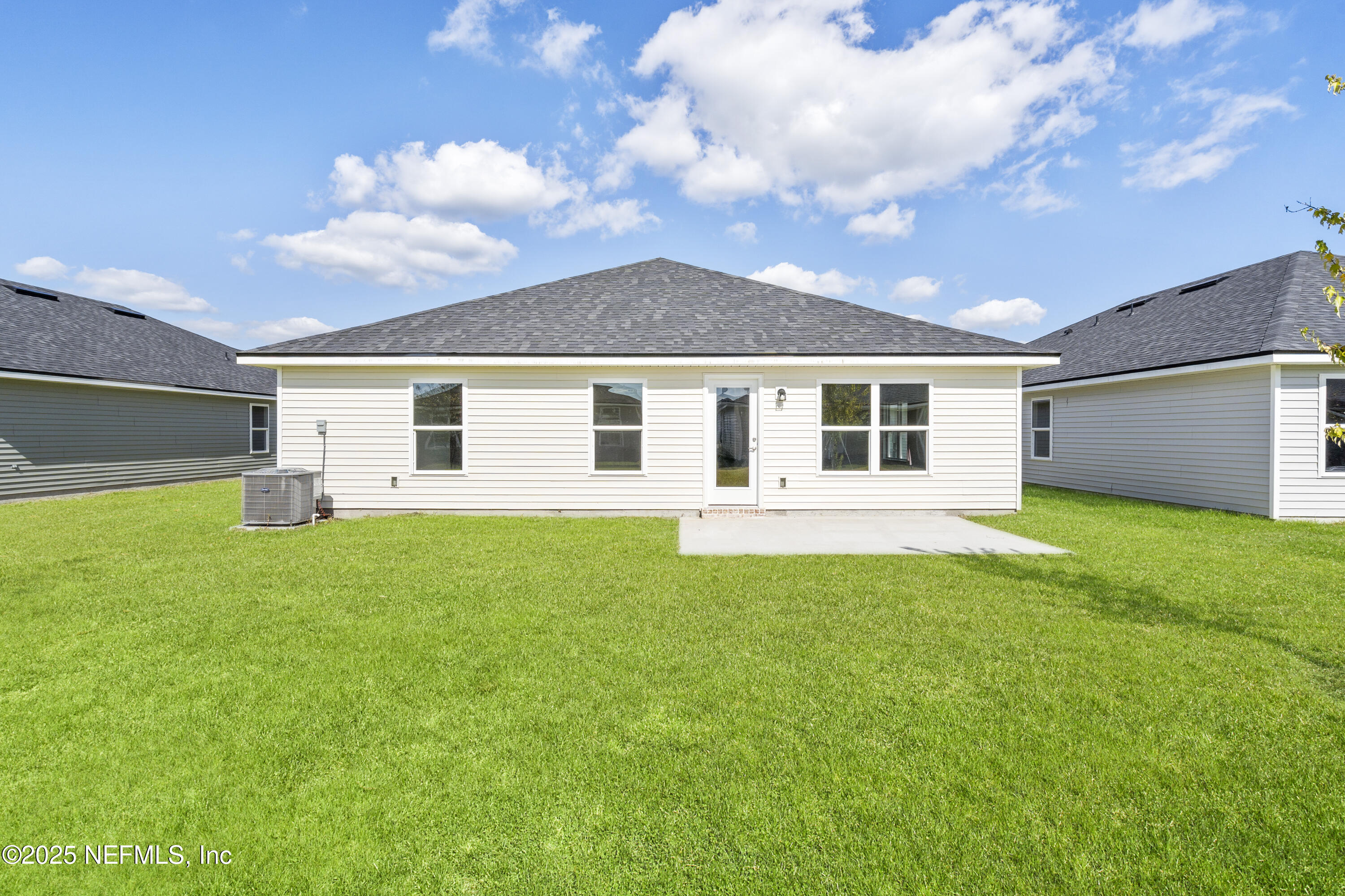 8340 Helmsley Boulevard Jacksonville, FL 32219 - Photo 36 of 56 a view of a yard with a house
