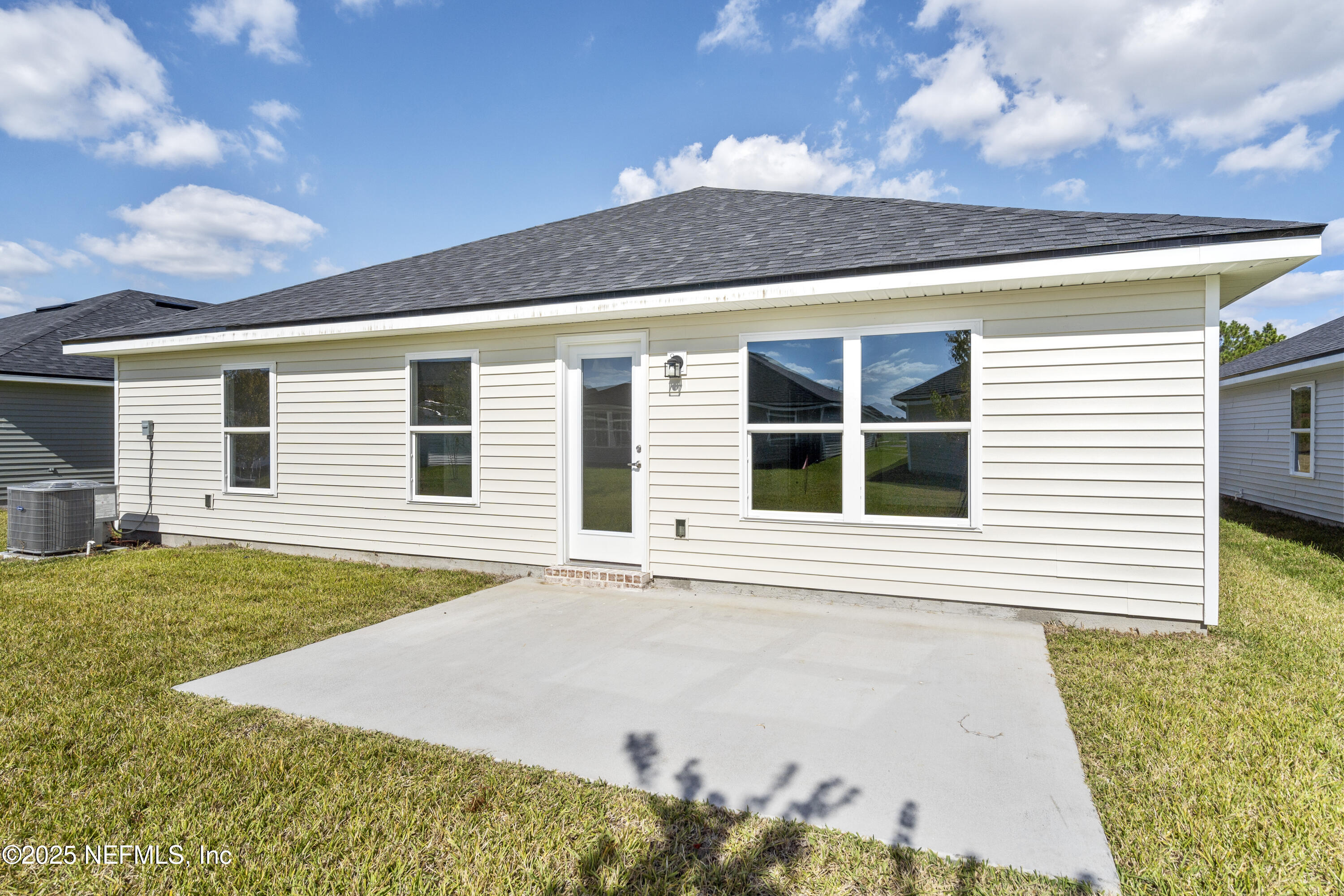 8340 Helmsley Boulevard Jacksonville, FL 32219 - Photo 37 of 56 a front view of a house with a yard
