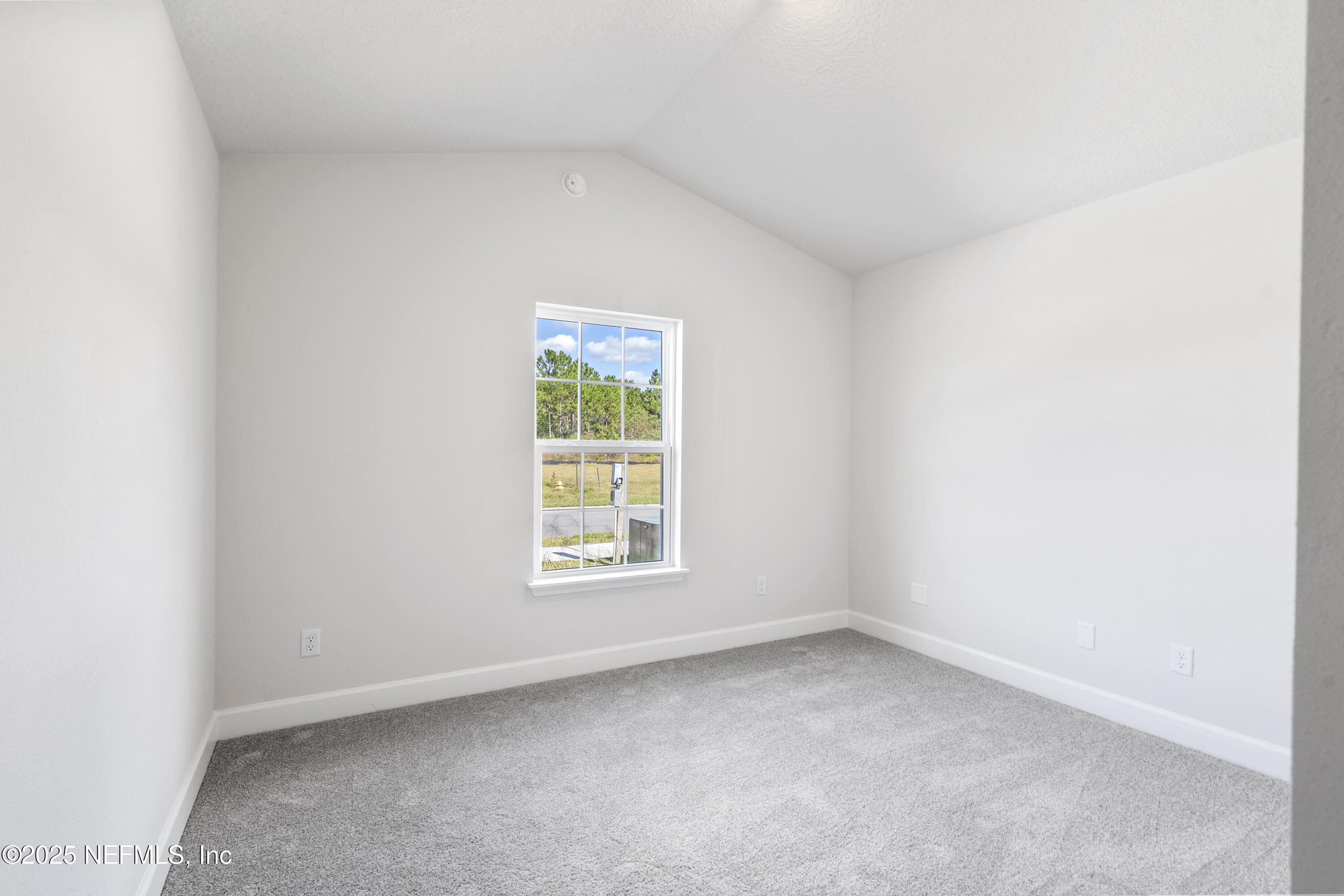 8340 Helmsley Boulevard Jacksonville, FL 32219 - Photo 39 of 56 an empty room with a window