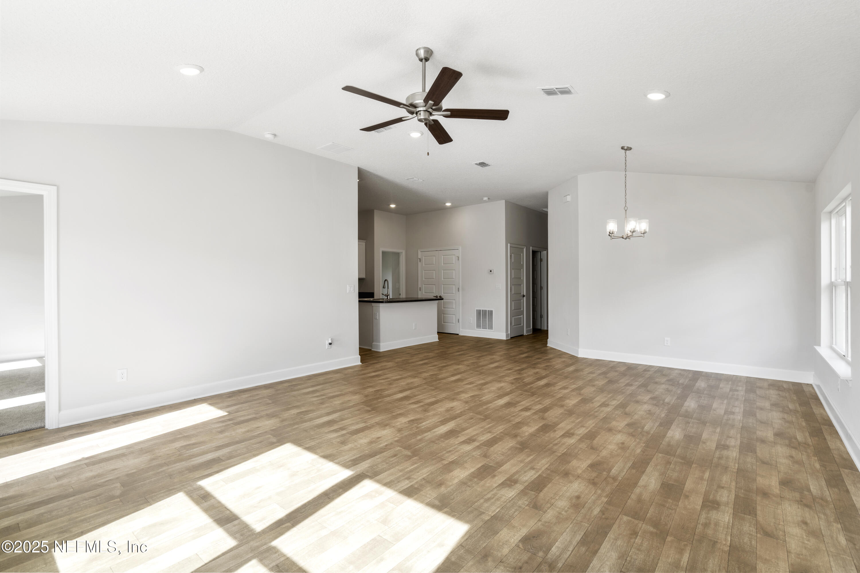 8340 Helmsley Boulevard Jacksonville, FL 32219 - Photo 46 of 56 a view of a livingroom with a ceiling fan and window