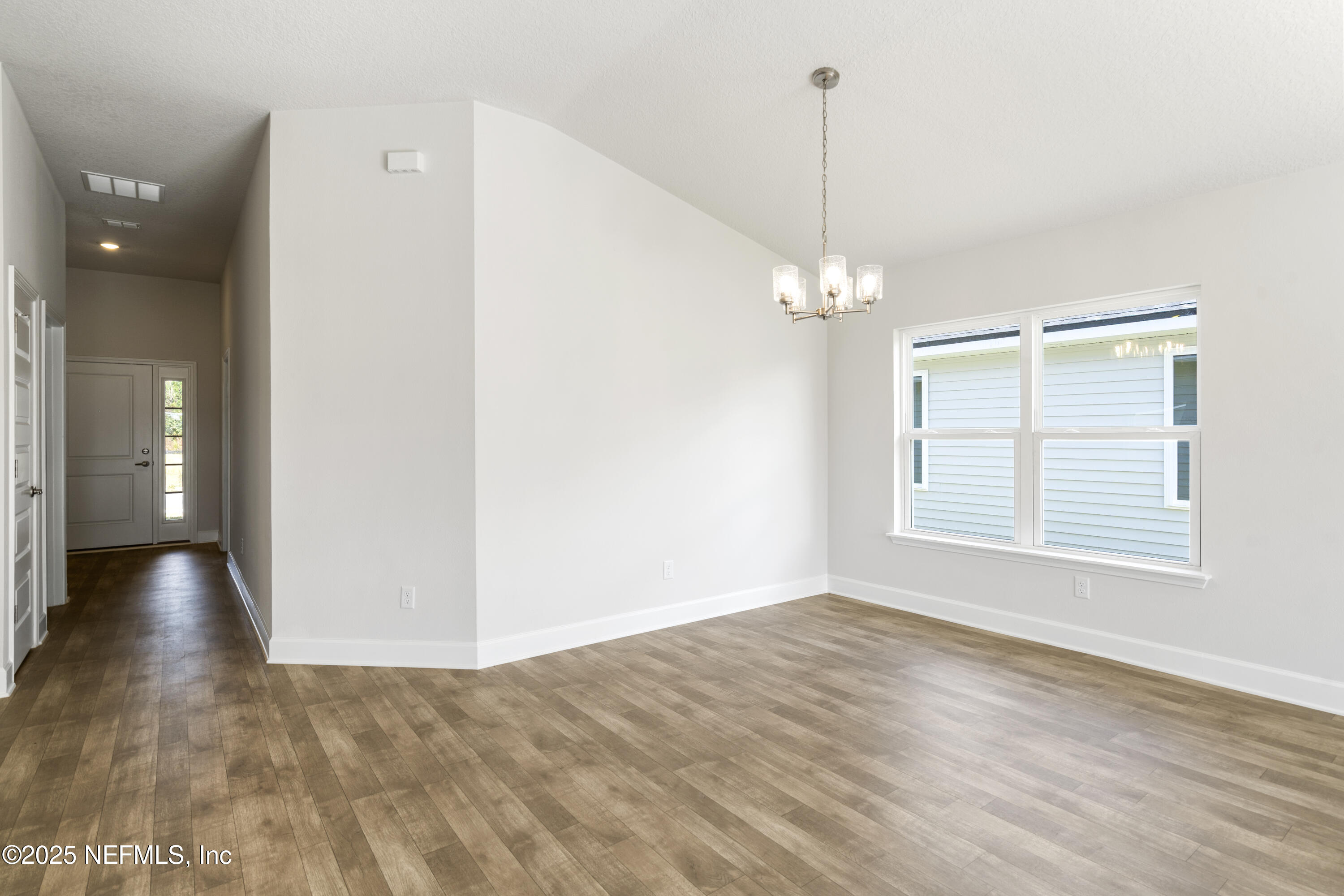 8340 Helmsley Boulevard Jacksonville, FL 32219 - Photo 47 of 56 a view of a livingroom with a ceiling fan and window