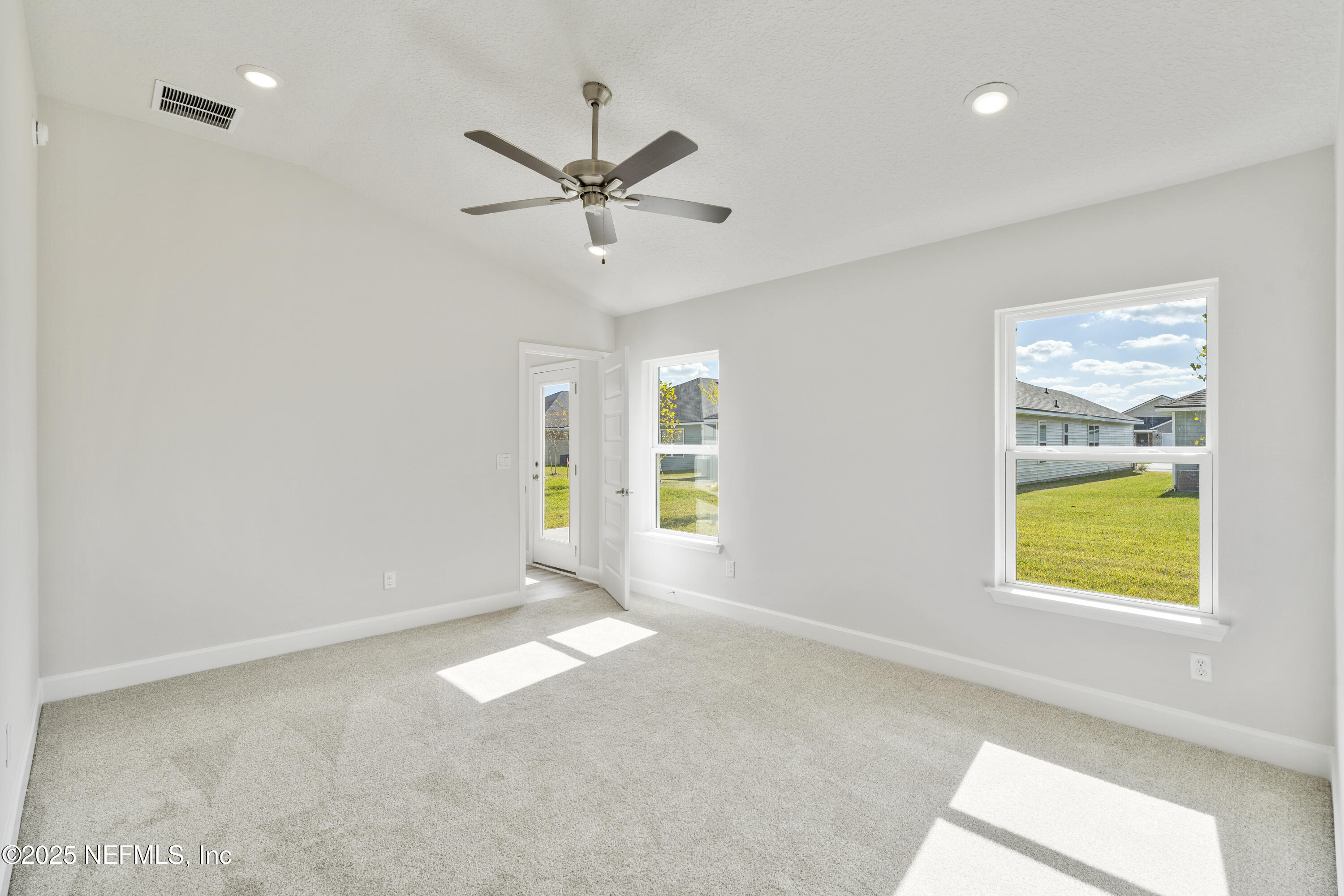 8340 Helmsley Boulevard Jacksonville, FL 32219 - Photo 53 of 56 a view of an empty room with a window